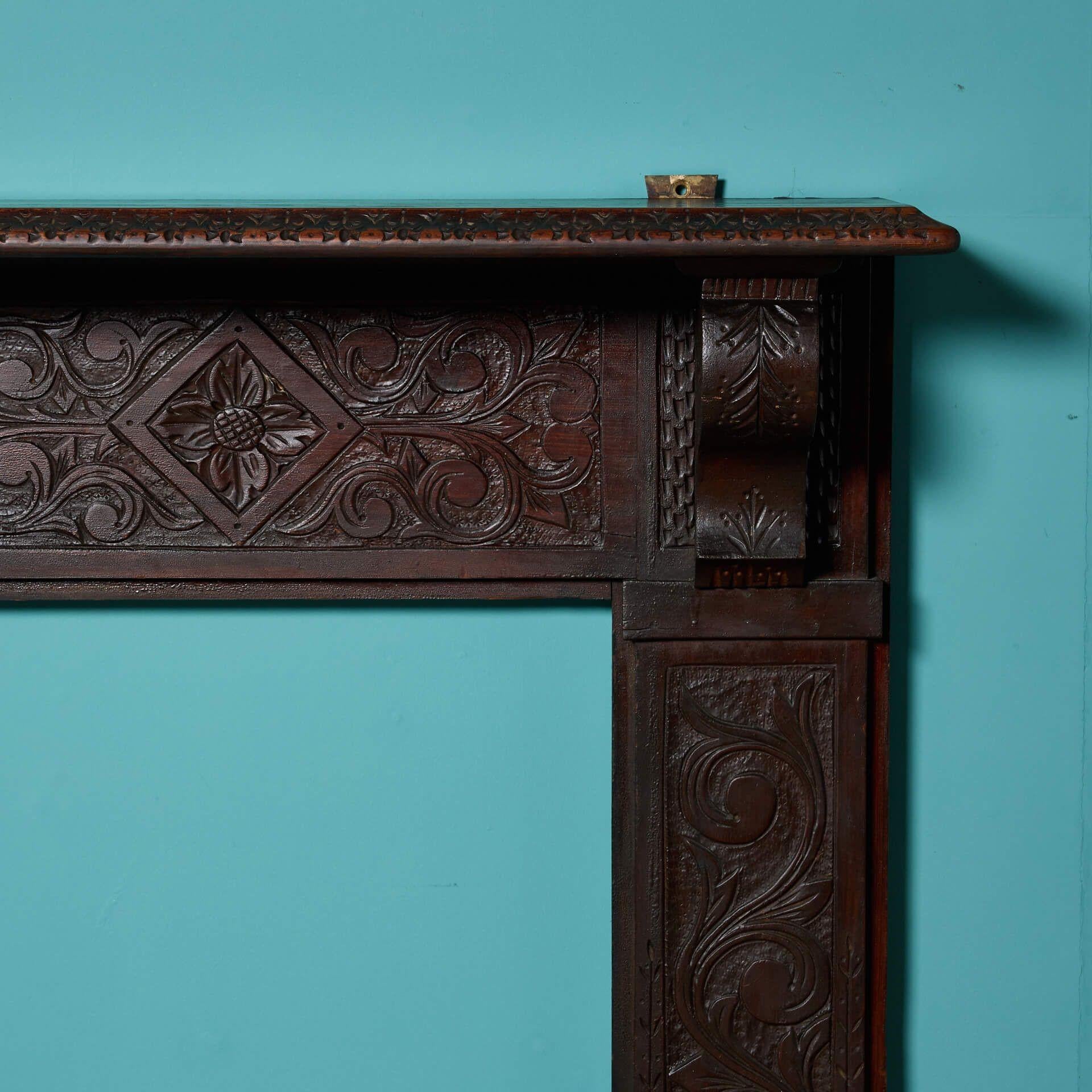 Jacobean Antique 19th century Tudor Style Carved Oak Fireplace For Sale
