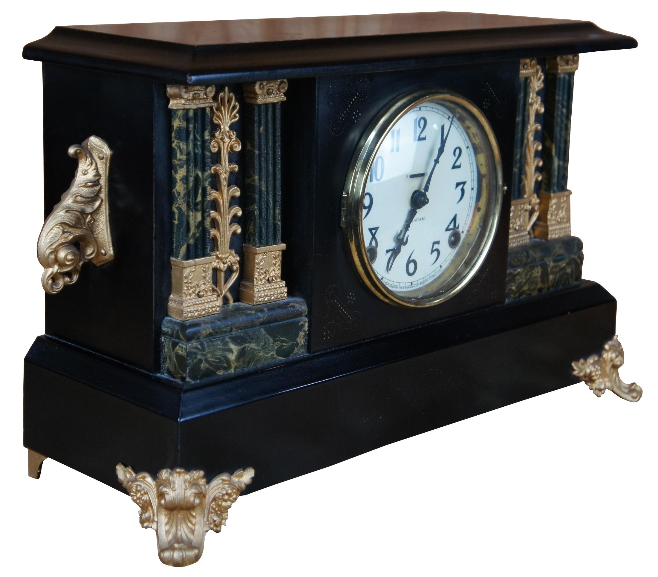 Antique Victorian 19th century E. Ingraham (Bristol Connecticut) ornate footed mantel clock with brass pendulum and key and acanthus and column / pillar design. Measure: 16