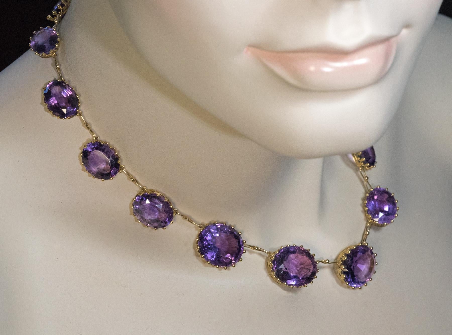 Circa 1890

This antique Victorian era 14K yellow gold necklace features graduating oval cut medium purple amethysts set in royal crown style gold heads.

Length 38 cm (15 in.)