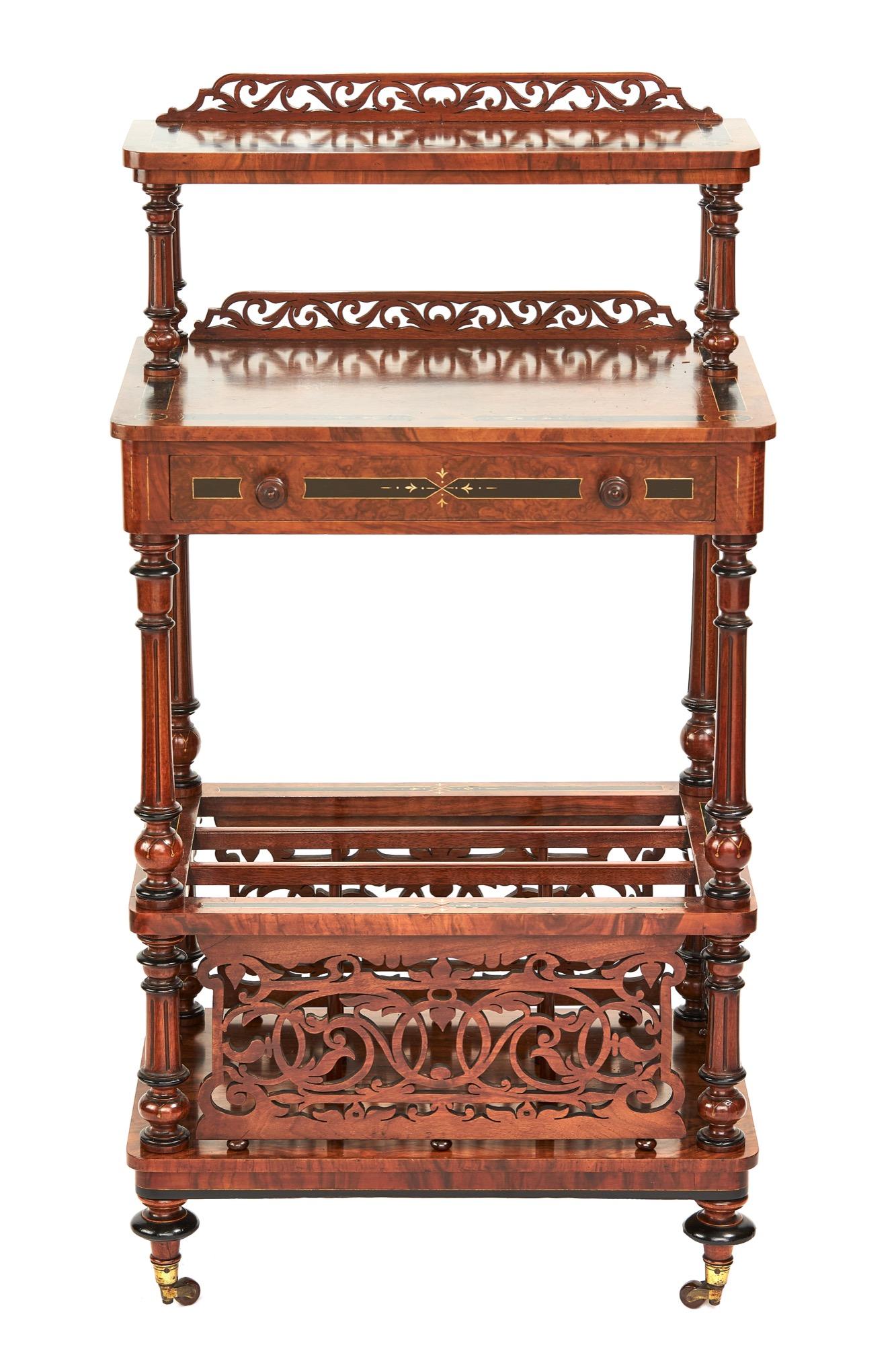 Antique 19th century Victorian burr walnut Canterbury whatnot having magnificent burr walnut veneer and pretty ebony inlay detail throughout, single drawer to the top and an outstanding quality three section fretwork Canterbury below. It is raised