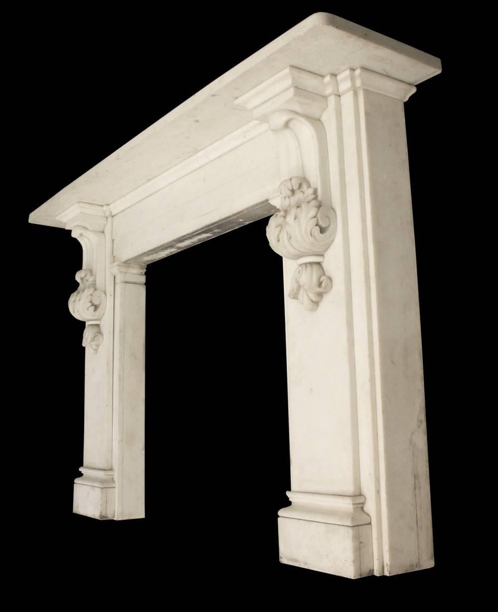 Superb antique William IV statuary white marble fire surround with extravagant inverted lambs tongue corbels which are embellished with acanthus leaves.

Images prior to restoration. This chimneypiece is awaiting restoration, please enquire as to