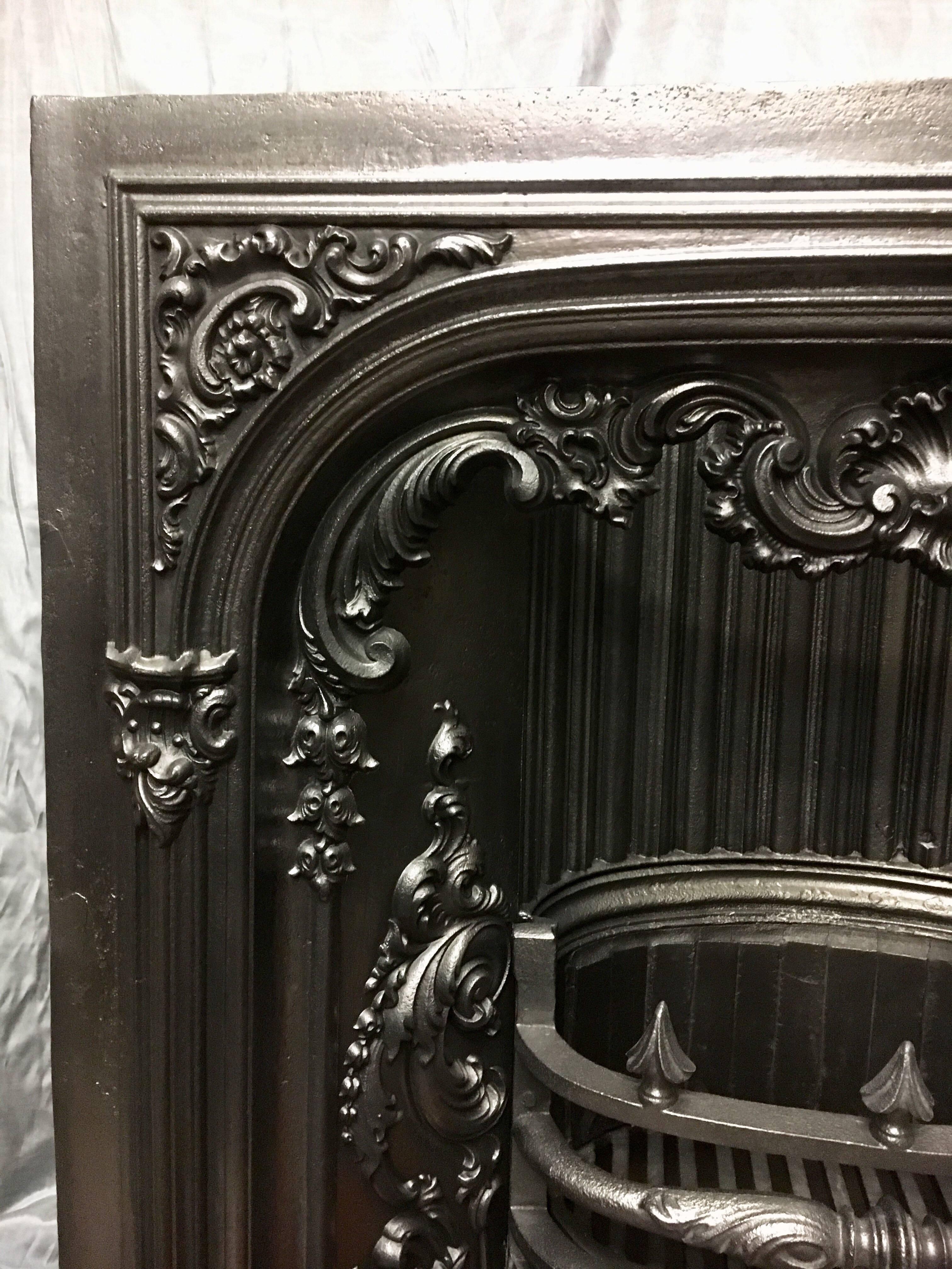A fully refurbished 19th century Victorian cast iron fireplace insert cast by the Carron foundry in 1840, we also have a set of slate surround slips that fit over the opening flange to accommodate larger fireplace openings. (Optional).

English,