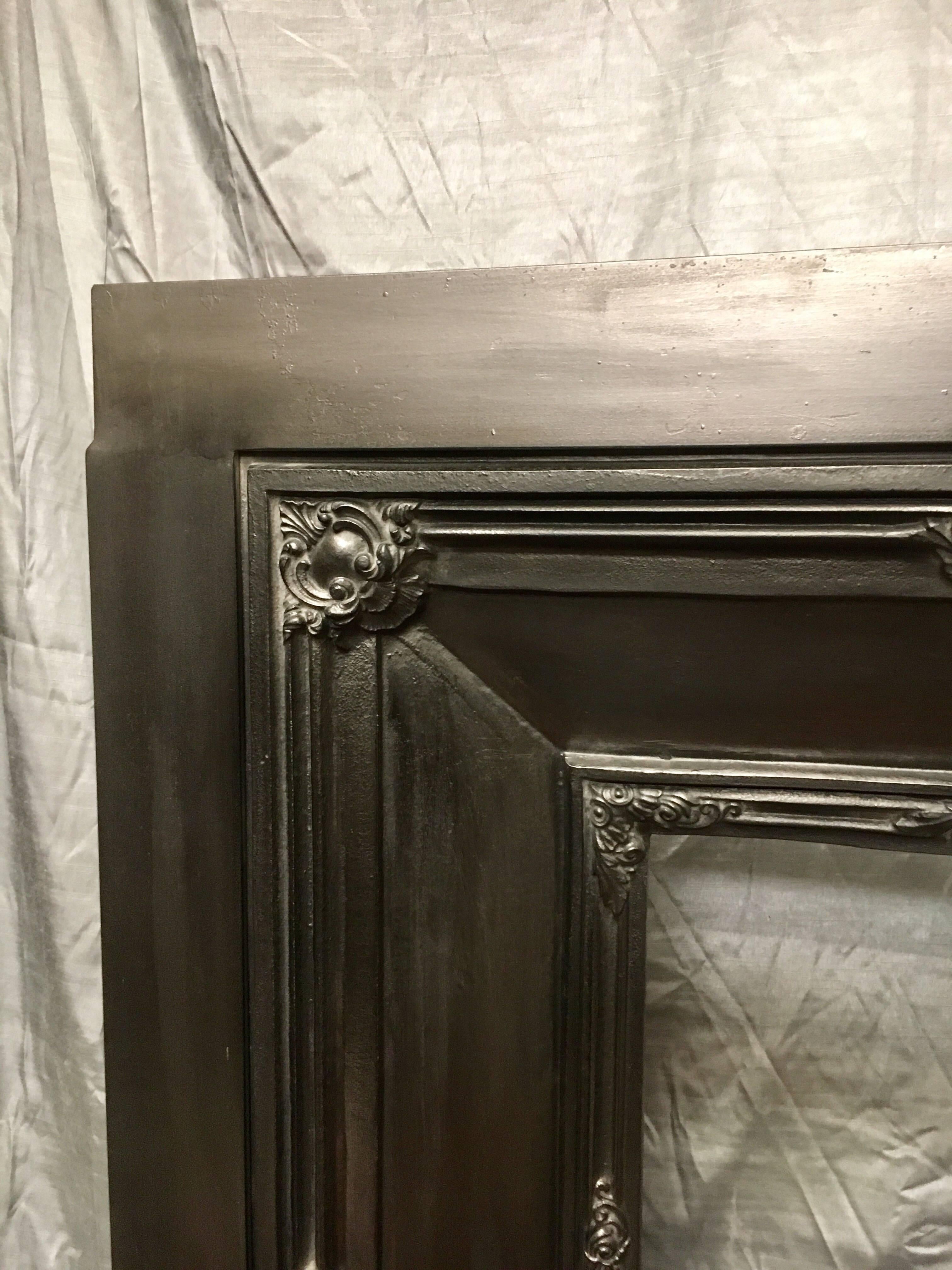 A small and well cast, antique victorian cast iron fireplace insert. Fully refurbished, painted with heat proof paint and graphite polished. A Scottish piece probably cast in Falkirk, Scotland around 1870c.

Fire opening size: 355mm wide x 650mm
