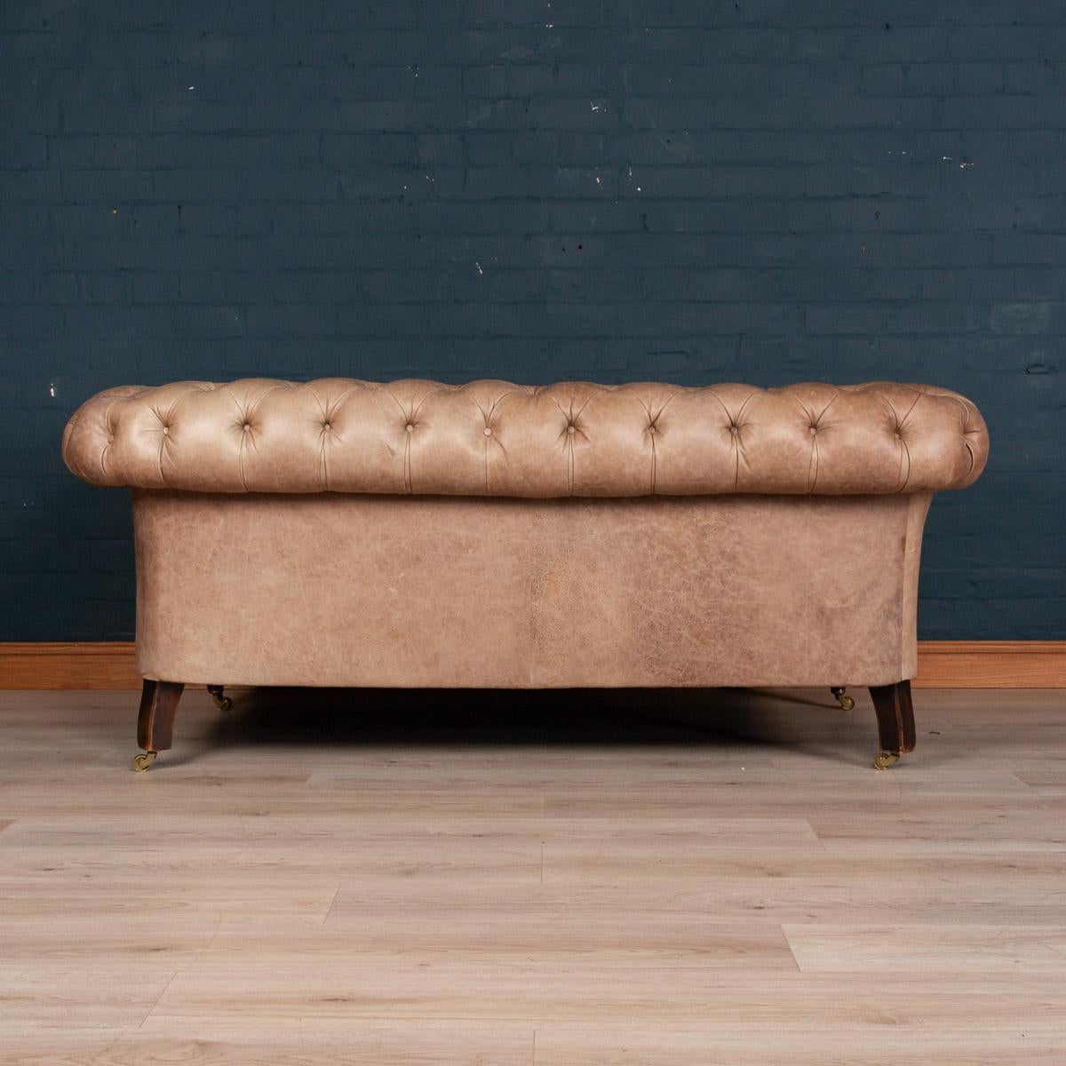 drop arm learher sofa antique