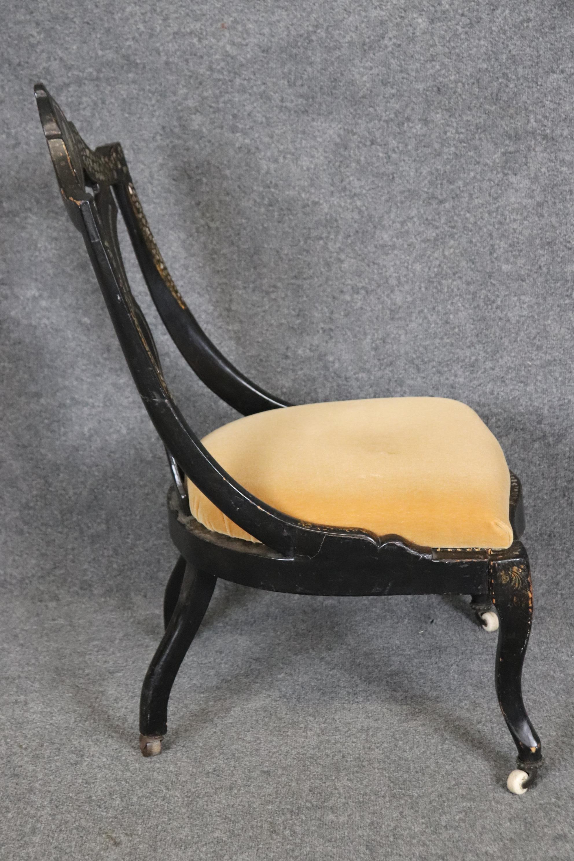 Dimensions - H: 36in W: 20in D: 25in SH: 16in

This Antique 19th Century Victorian Ebonized Mother of Pearl Inlaid Slipper Chair is truly a unique piece! If you look at the photos provided you will see the attention to detail within the inlaid