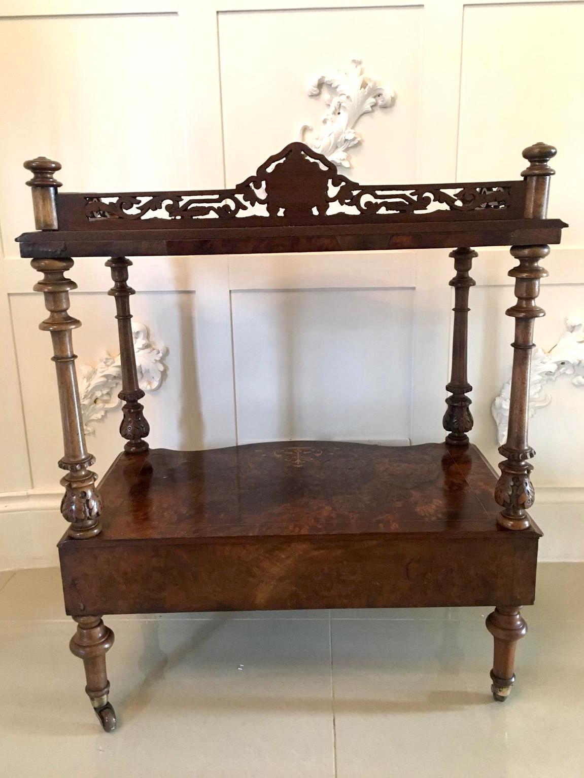 This is a quality 19th century antique Victorian burr walnut inlaid whatnot having a pretty carved pierced inlaid gallery and a splendid burr walnut inlaid serpentine shaped top. It is raised on 4 elegantly shaped carved turned solid walnut columns