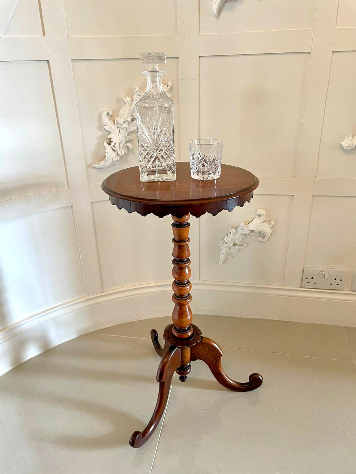 Quality antique 19th century Victorian mahogany round lamp table having a glorious quality round mahogany top with a thumb moulded edge. It boasts an unusual fabulous shaped frieze, supported by an elegant turned column and raised on three shaped