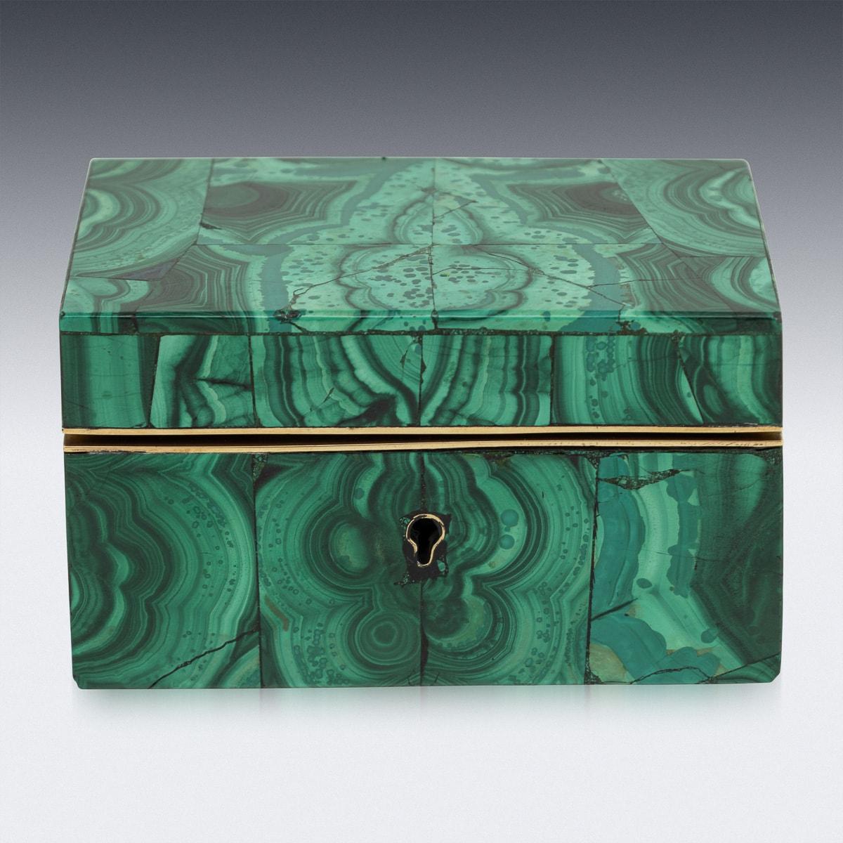 Antique late 19th Century malachite box. This box features malachite pieces throughout the whole outer body with brass details. Inside, the original soft suede lining. This box serves not only as a perfect accessory for jewellery or other treasures