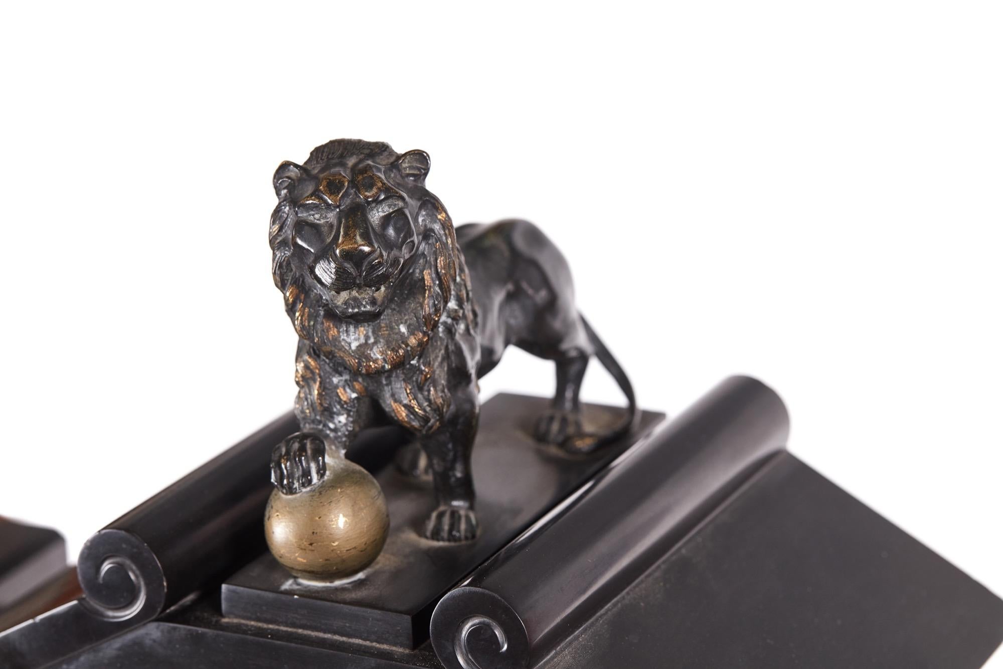 This is a large outstanding antique 19th century Victorian antique marble architectural mantel (fireplace) clock with a stunning gilt dial and Japy Freres twin train movement. The case with bronze figural mounts is surmounted by a lion. It is in