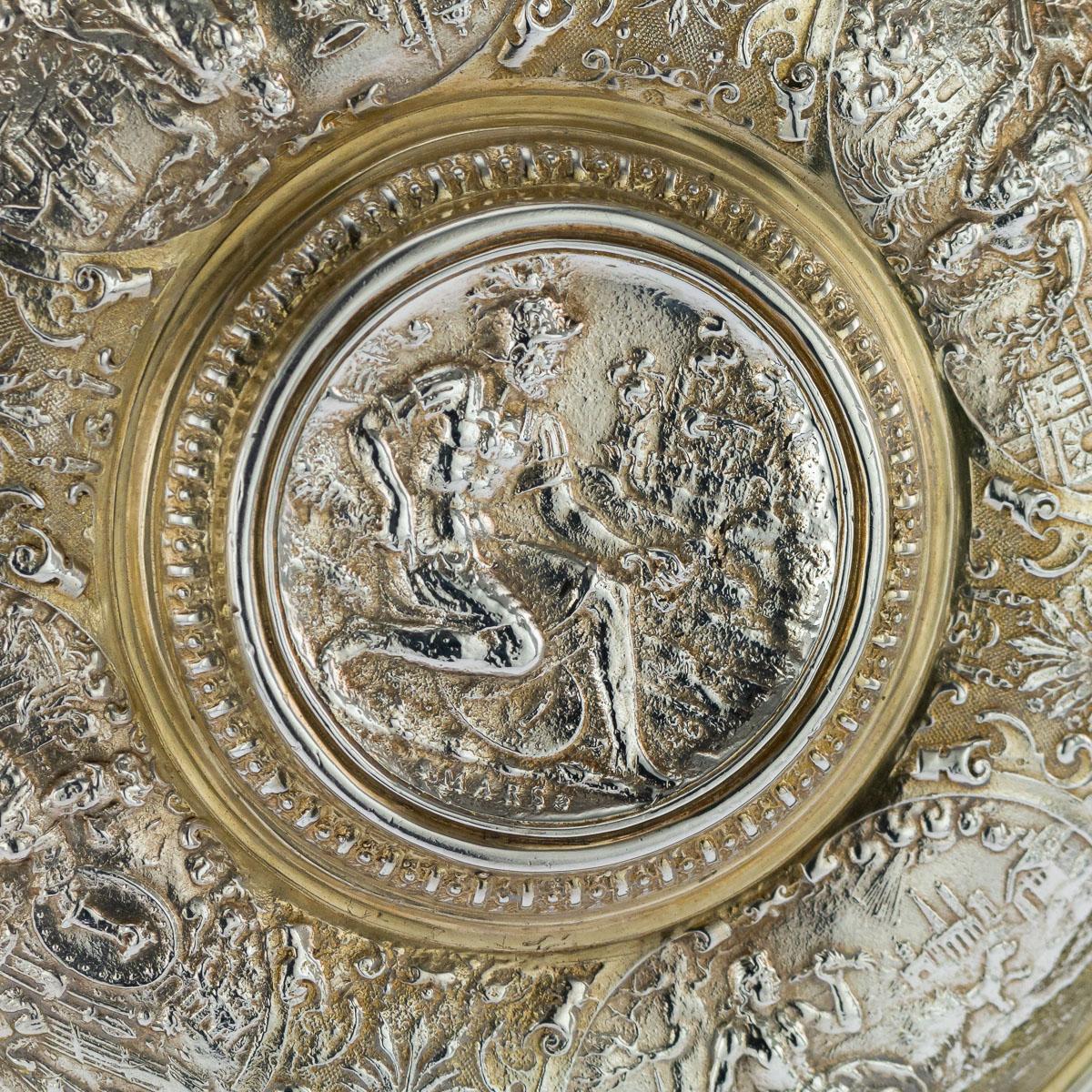 Antique 19th century Victorian rare solid silver wall plaque / sideboard dish, of impressive size and weight, richly part-gilt, the centre plaque with depiction of Mars, surrounded by cartouches bearing personifications of Pax, Abundantia, Bellum