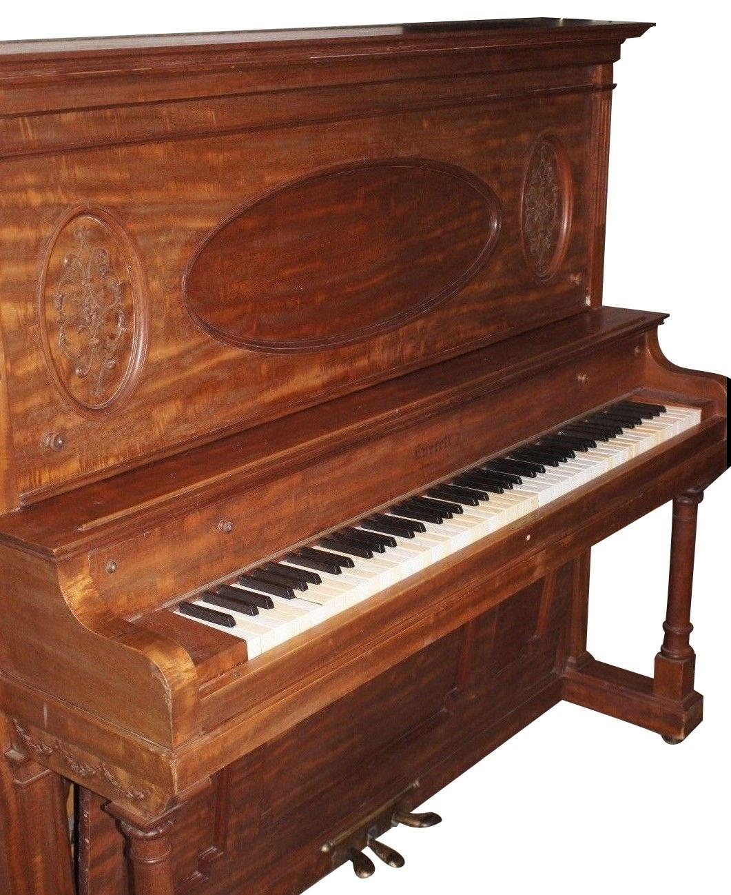 Antique 19th century Victorian upright piano by The Everett Piano Co. Boston

Here is a fine upright piano! Made in Boston by The Everett Piano Co. and features 88 keys 
Has a wonderful wood finish with hand carved designs on the front.