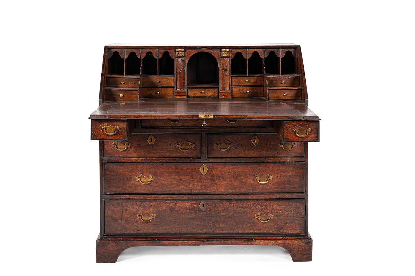 Antike 19. Jahrhundert warmes Braun Englisch Oak Regency  Schreibtisch mit schräger Front (Britisch) im Angebot