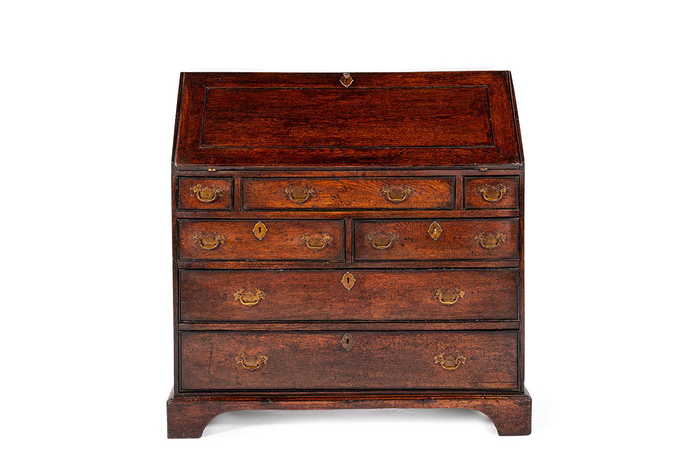 Antike 19. Jahrhundert warmes Braun Englisch Oak Regency  Schreibtisch mit schräger Front (Lackiert) im Angebot