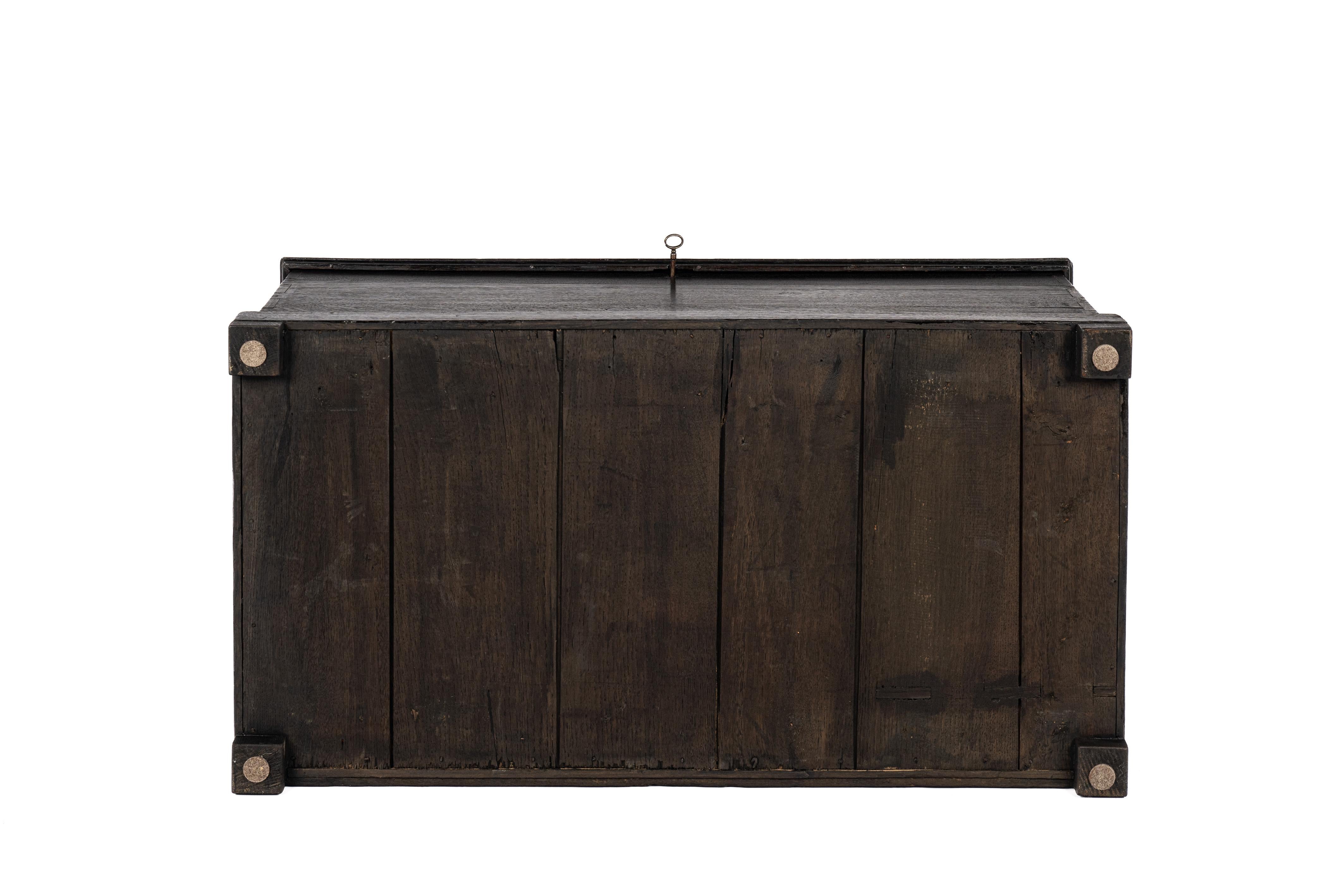 Oak Antique 19th-century West German black oak blanket chest trunk or coffer For Sale