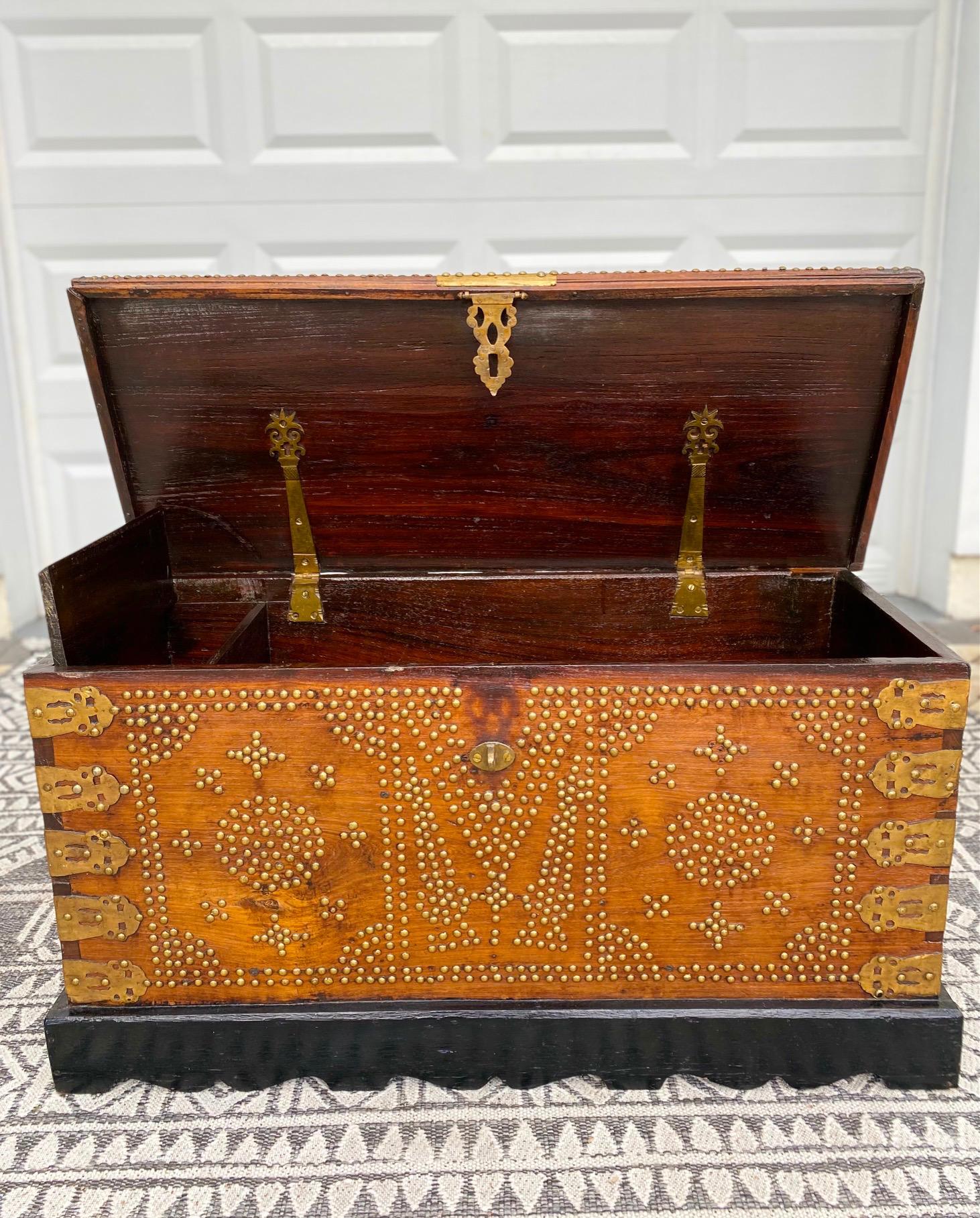 Hand-Carved Antique Zanzibar Chest in Teak Wood with Brass Overlay and Studs For Sale