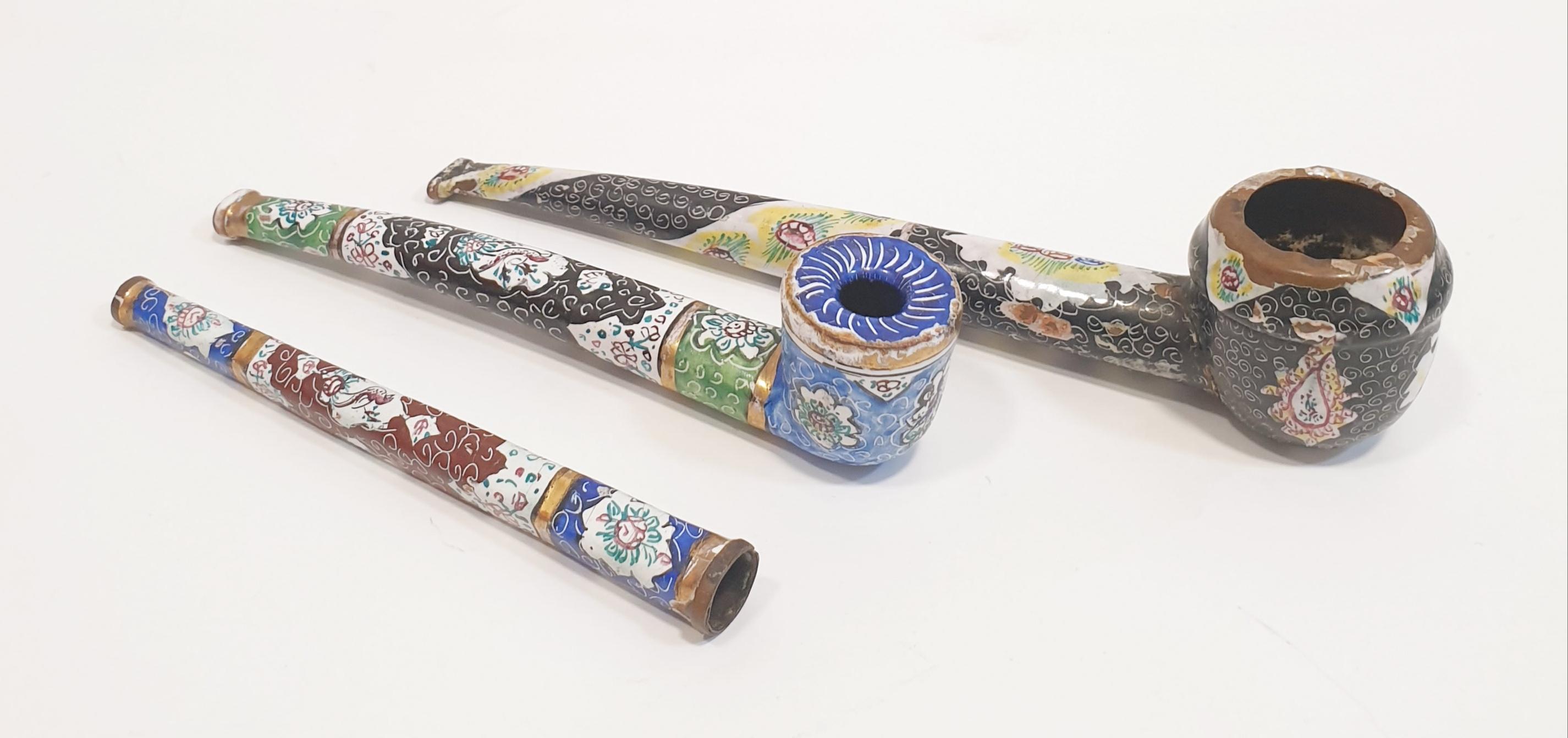 Antique 19th Hand Painted Porcelain pipes with promenade scene

PRADERA is a second generation of a family run business jewelers of reference in Spain, with a rich track record being official distributers of prime European jewelry brands like