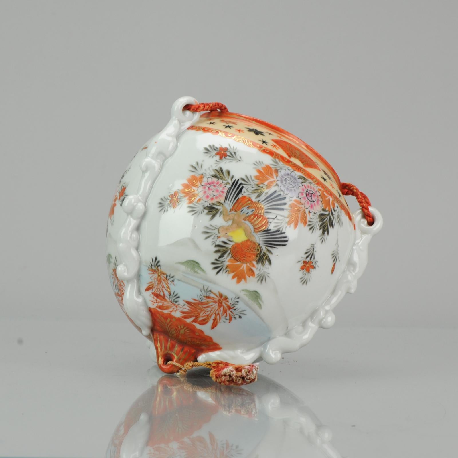 Very lovely piece. With an overall landscape scene of mountains, flowers and birds in flight.

Condition
Upper rim is over fired and has some repainting. Size: 150 x 150 mm D x H
Period
Meiji Periode (1867-1912).