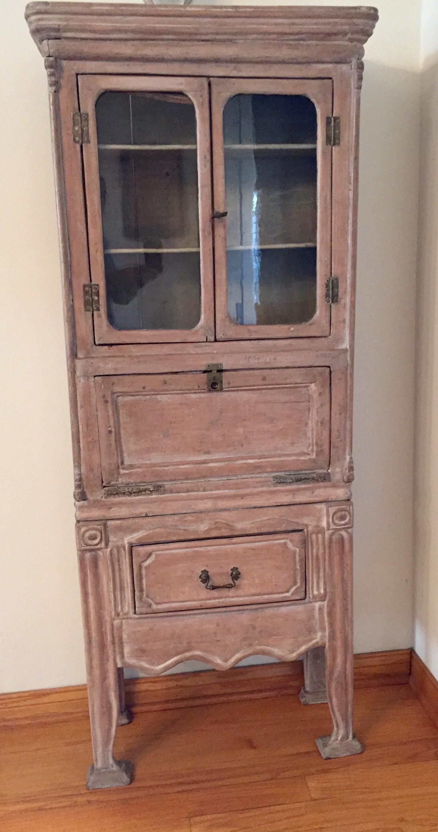 Antique late 19th century French petite Victorian cabinet secretary desk, circa 1900.
Elegant with traces of old paint, good patina, pitch pine.
An exquisite late 19th century French Provincial style writing desk with original brass hardware,