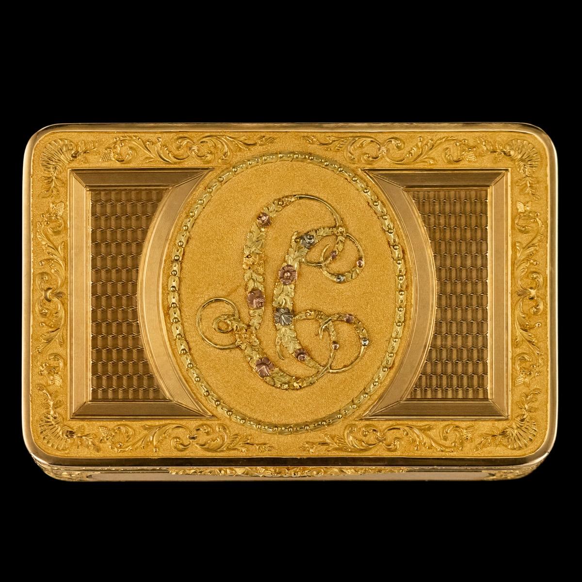 Antique early-19th century Austrian exceptional four-color 18 karat gold snuff box, of rectangular form with rounded corners, the hinged covers beautifully engraved with shell and scroll decoration, engine turning in reserves and applied with an