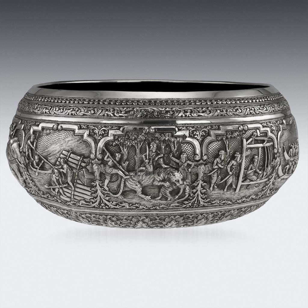 Antique late 19th century Burmese, Myanmar solid silver thabeik repousse' bowl, very well made and heavy gauge, repousse' decorated in high relief with ten different scenes from the Burmese mythology, representing various figures and animals in a