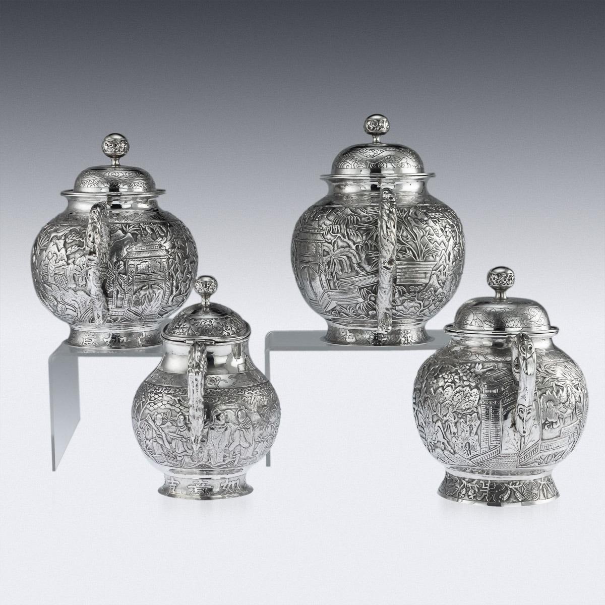 Antique 19th century Chinese impressive solid silver four-piece tea and coffee set, of traditional round form resting on a spreading base, decorated with Chinese calligraphy, the body finely and profusely chased with figures in a landscape, the