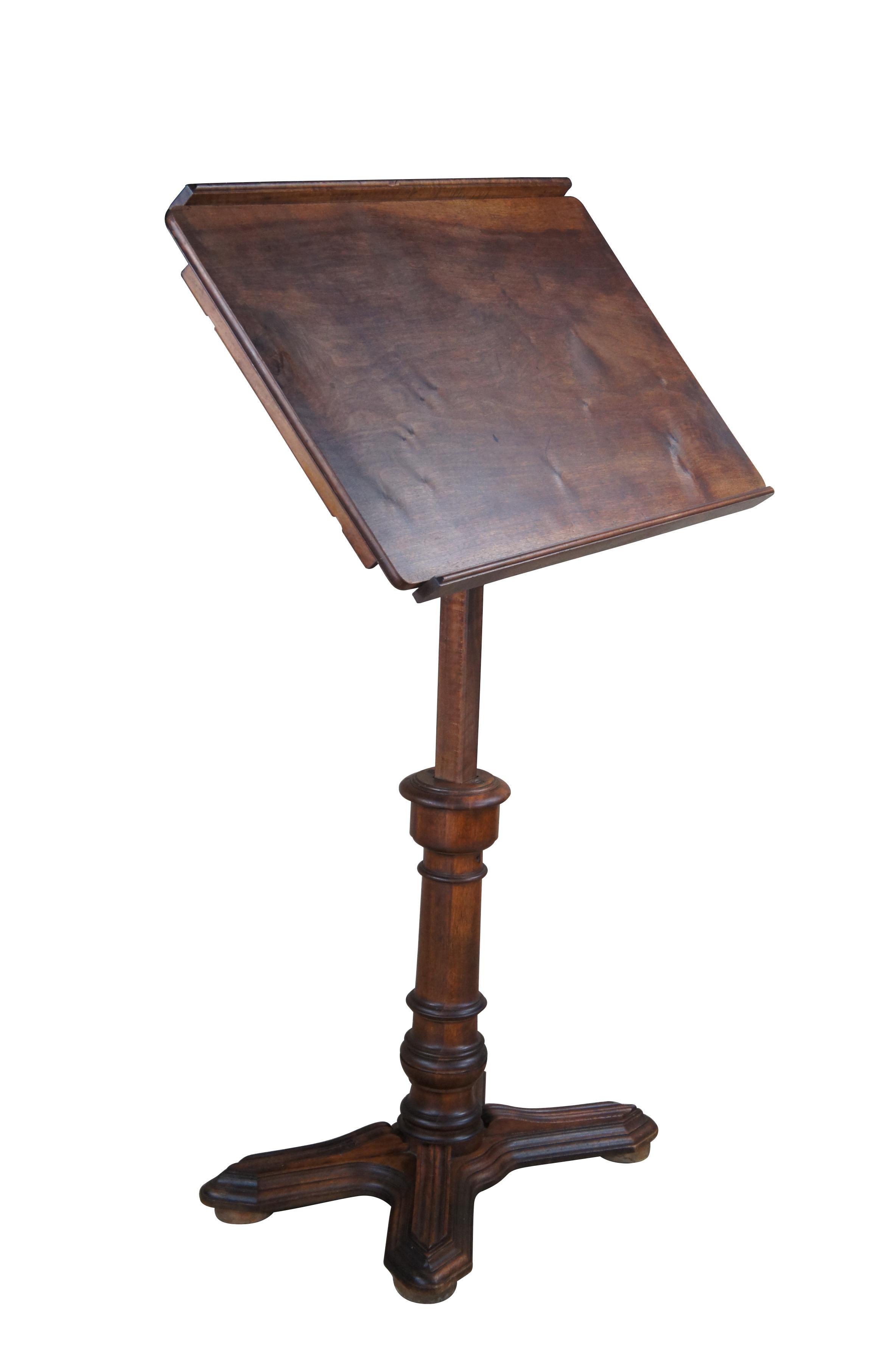 Antique circa 1870s drafting table or lecturn manufactured by Emile Chouanard, the director of the Aux Forges de Vul-cain in Paris at 3 rue Saint-Denis.  This late 19th century drawing board / architect stand features a top that is completely