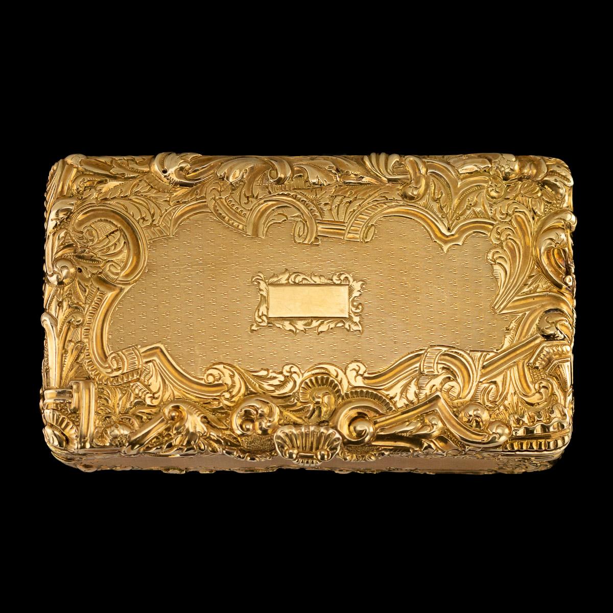 Antique mid-19th century French 18-karat solid gold snuff box, rectangular shaped, engraved with scrolls and flowers on an engine turned ground, applied with a shell thumbpiece. Hallmarked with French marks (tested 750 standard), Paris, Maker JY