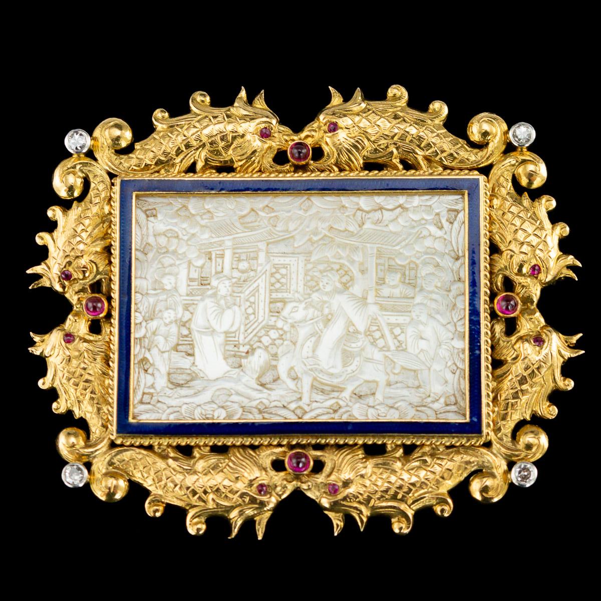 Antique late 19th century French chinoiserie gold and guilloche enamel brooch, of shaped rectangular form, the center mounted with a Chinese made, exquisitely carved mother of pearl panel depicting a Chinese aristocrat on horseback being welcomed,