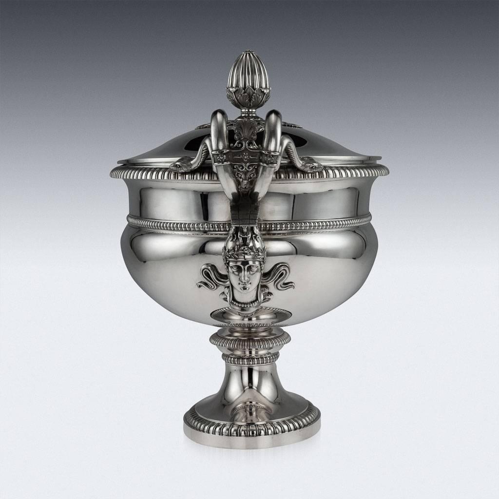 Antique 19th century French Magnificent solid silver soup tureen, cover and liner, impressively large and exceptionally heavy, standing on oval spreading foot. The plain body applied to both sides with realistically modelled Minerva heads and