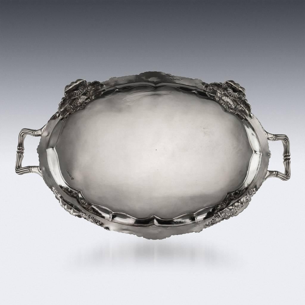 Antique 19th century rare Georgian solid silver two-handled tray, exceptionally heavy, of oval form, the applied cast rim with acanthus leaves and shells at intervals, each side terminating with heavily decorated acanthus handles. The tray is