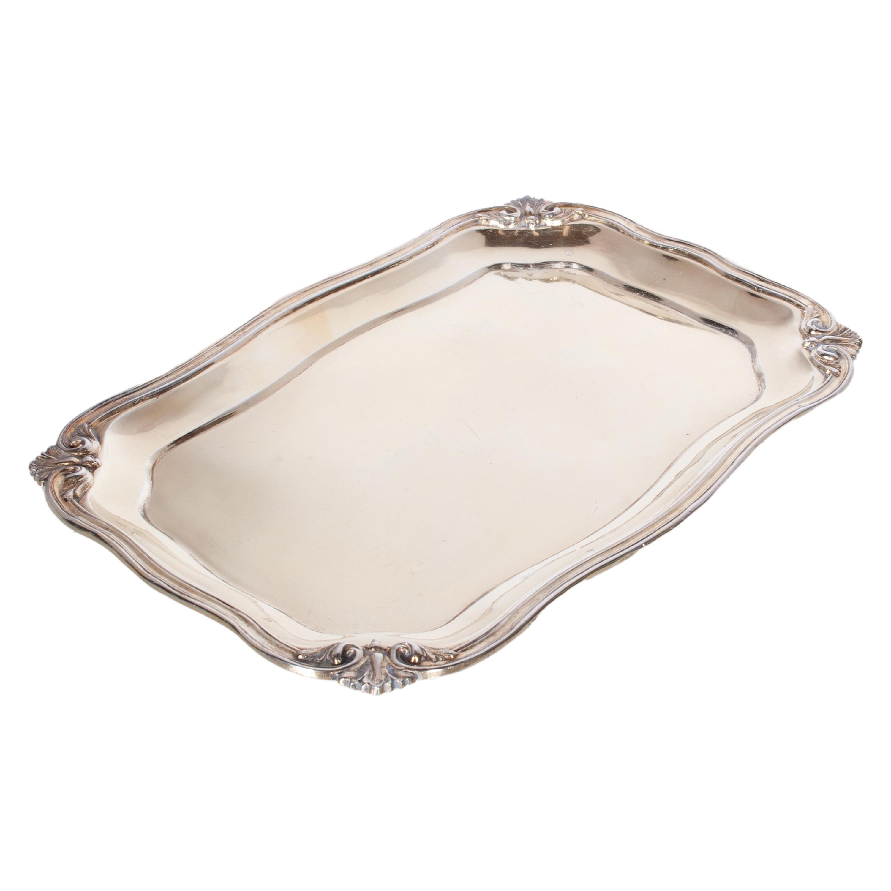 A fine antique 19th century Russian Imperial 840 grade silver gilt tray by Adolf Sper, St. Petersburg, 1845.
Sper was a silversmith & jeweler to the Russian Imperial family, this solid silver tray is in the Rococo Revival style and has a wavy ribbed