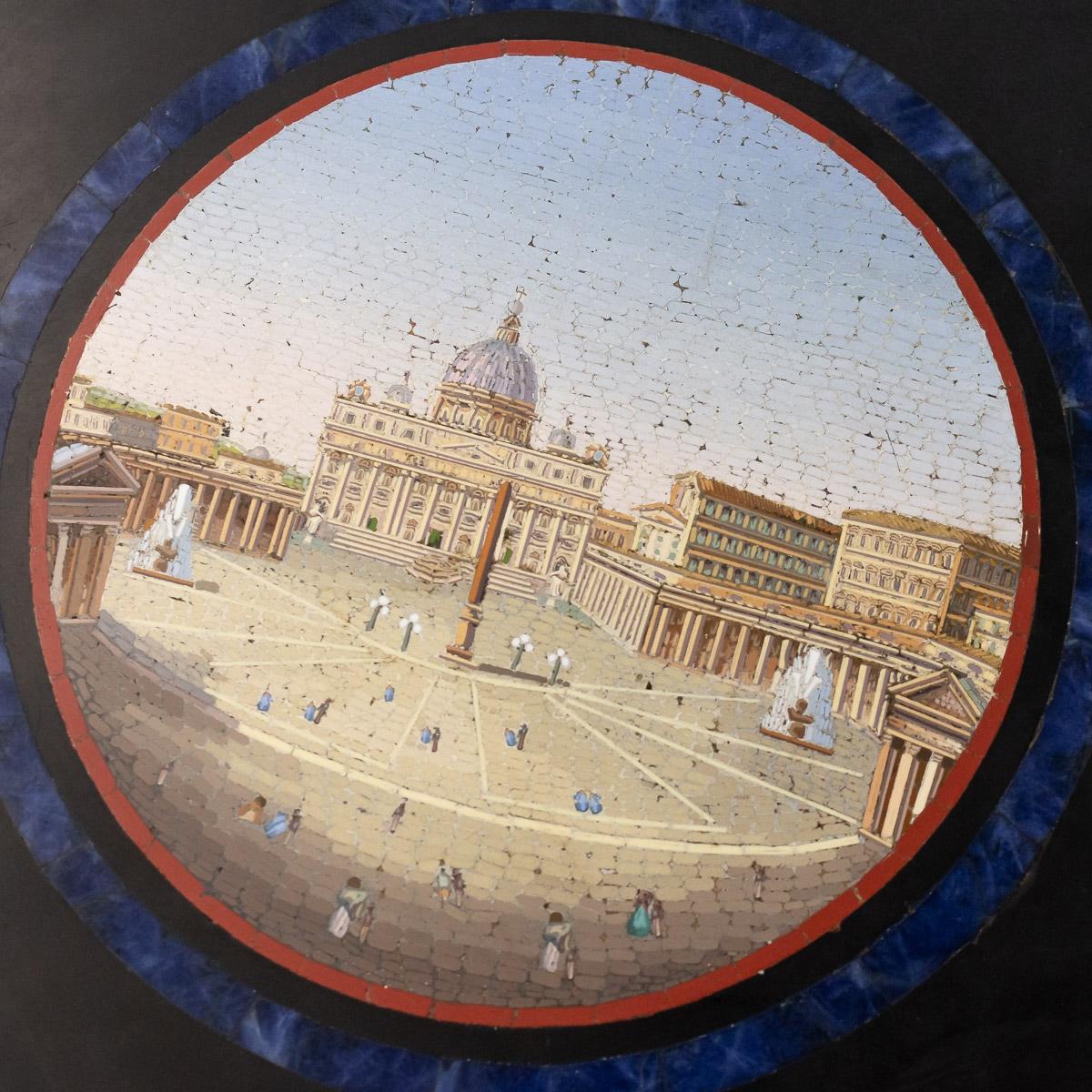 Description

Antique 19th century Italian Grand Tour Micromosaic tabletop centered by a roundel showing St. Peter's Square within a lapiz lazuli border, and surrounded by six ovals depicting the Temple of Vesta, St. Angel Castle and the Tiber