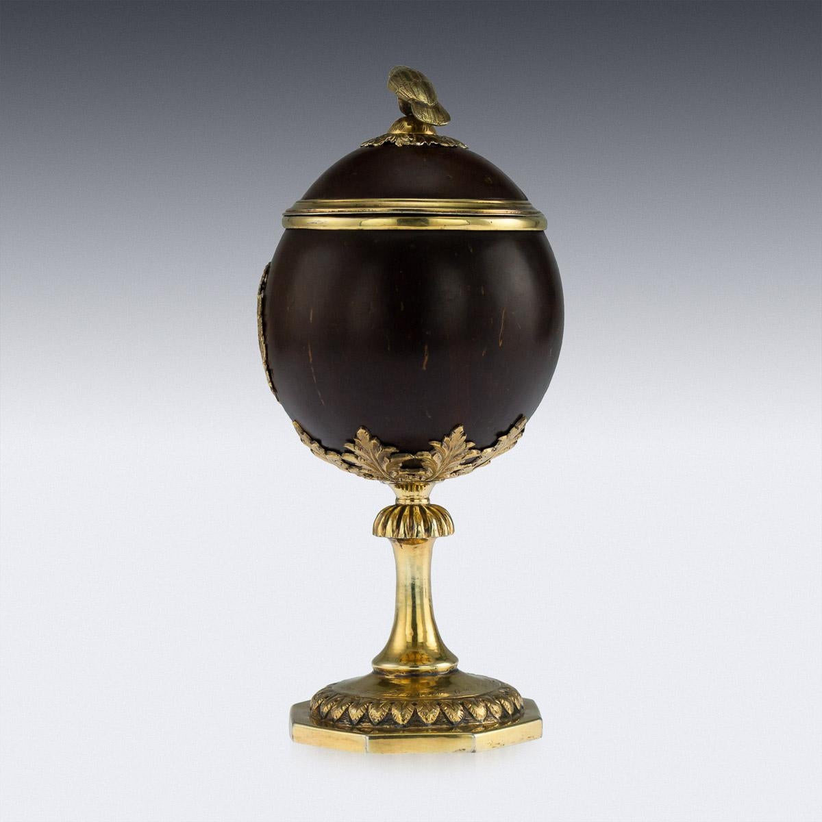 
Antique early 19th century Russian rare Provincial silver-gilt mounted coconut lidded cup, the coconut standing on a solid silver octagonal base, beautifully chased with acanthus leaves and engraved (1830 year, April 6th, sign of gratitude), the