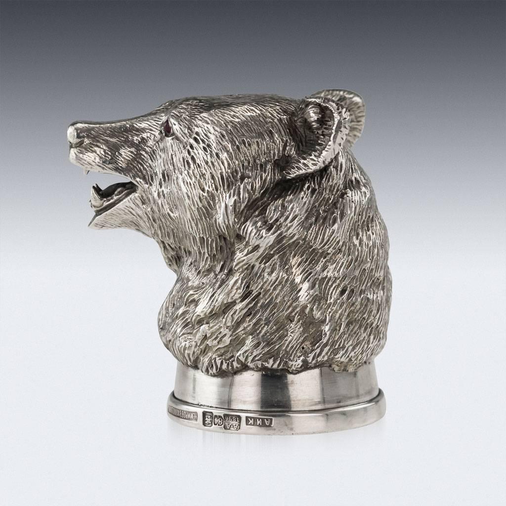 Antique 19th century rare Imperial Russian solid silver stirrup cup in a shape of a bears head, cast, chased and engraved, eyes set with cabochon garnets. Hallmarked Russian silver 84 (875 standard), Moscow, year 1896, Assay Master A.A (Anatoly