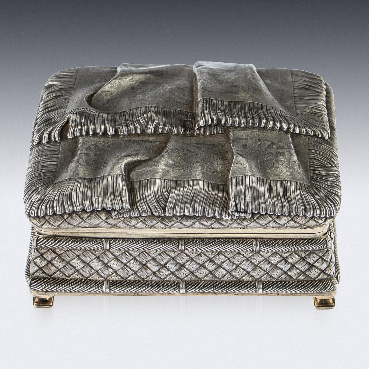 Antique late 19th century Imperial Russian solid silver trompe l'oeil casket box, rectangular shape with canted sides, engraved and repoussé, imitating draped linen over a woven birch bark. Hallmarked Russian Silver 84 (875 standard), Moscow, Makers