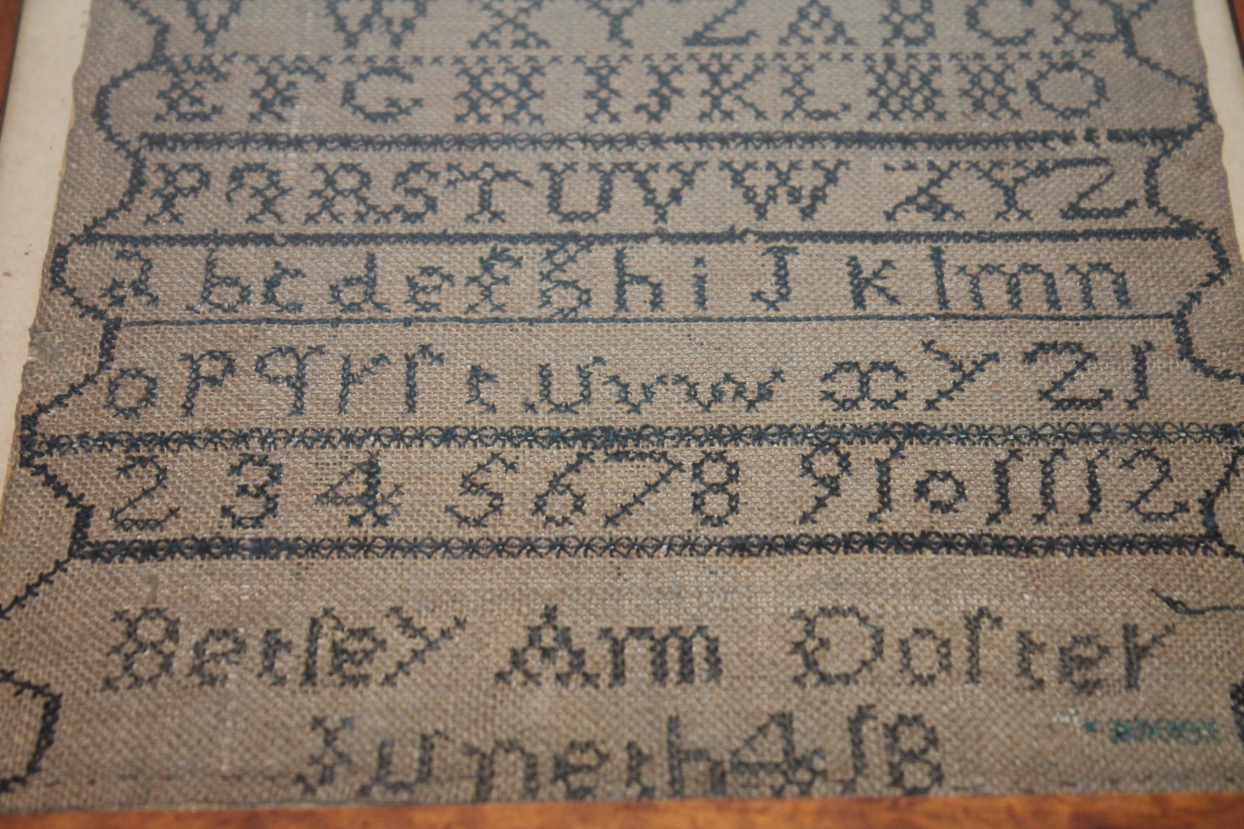 This fine school girl sampler was found in a collection in Philadelphia, Pennsylvania and is dated 1804 at the very bottom of the sampler. It was made by Beriey Ann Dorter ??? Hard to read.This was done on a handmade or woven homespun linen. It