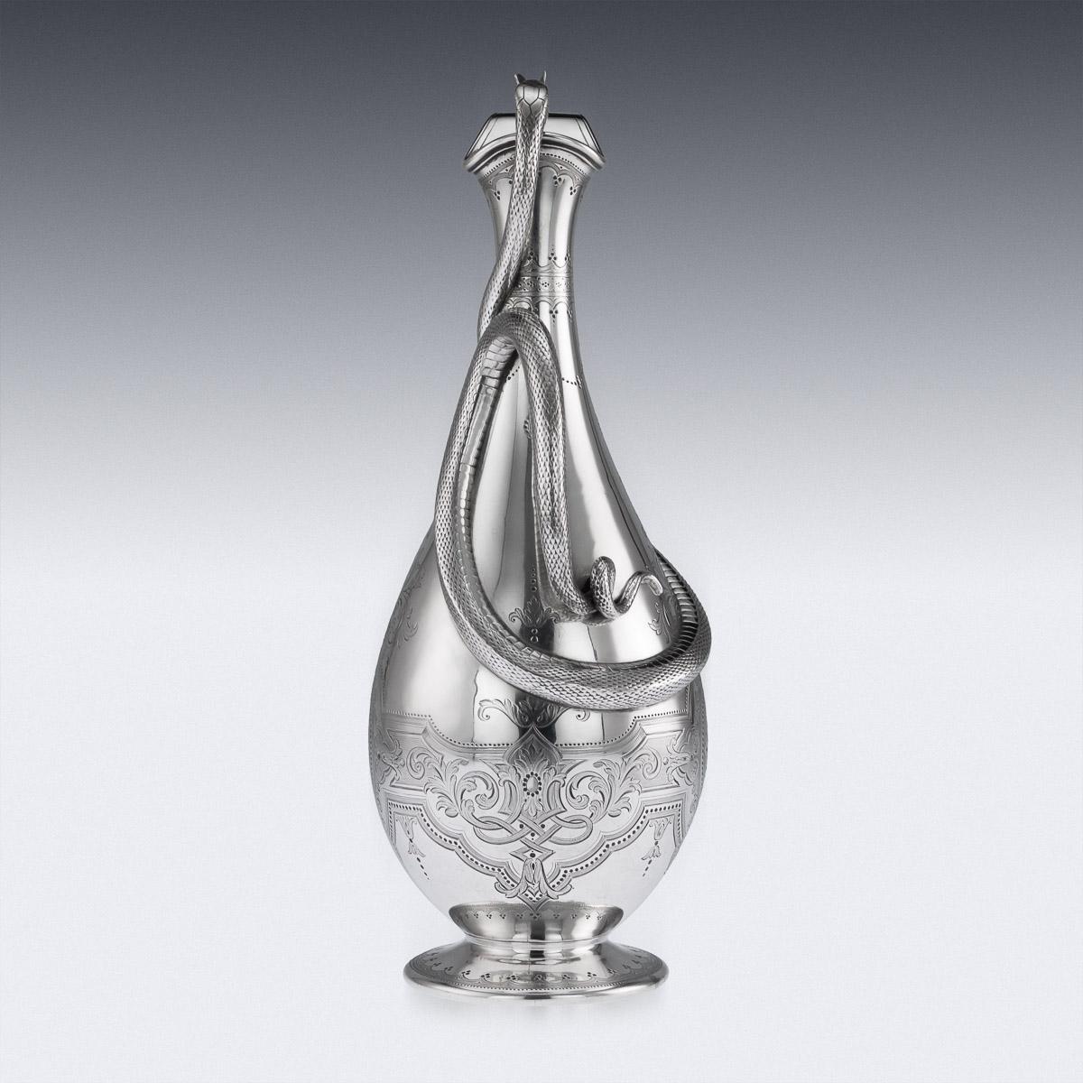 Antique mid-19th century Victorian solid silver magnificent wine jug, very large, baluster form, the body engraved with foliate strapwork and applied with an entwined snake handle, the hinged cover applied with a butterfly, the front engraved with a