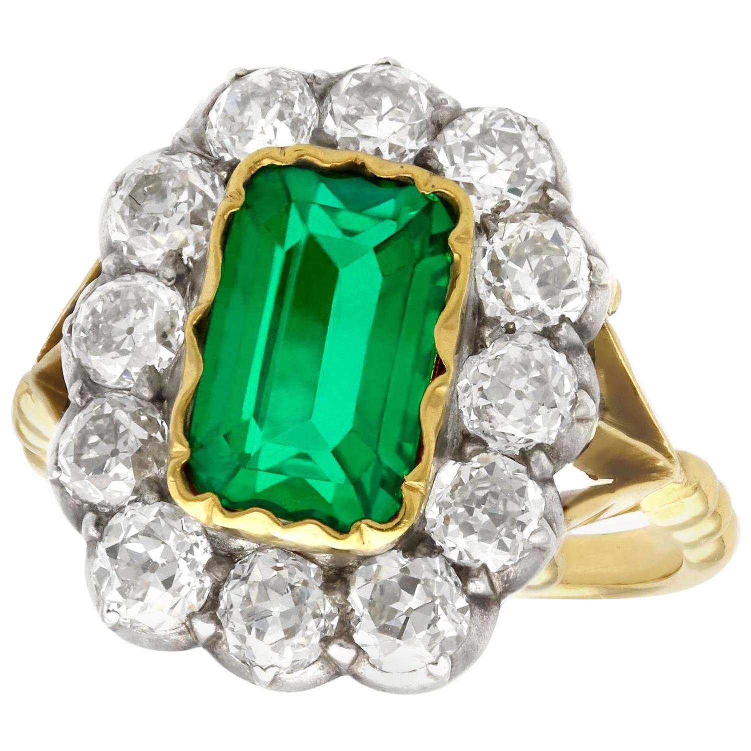 Antique 2 Carat Colombian Emerald & 2.2 Carat Diamond Yellow Gold Cocktail Ring For Sale