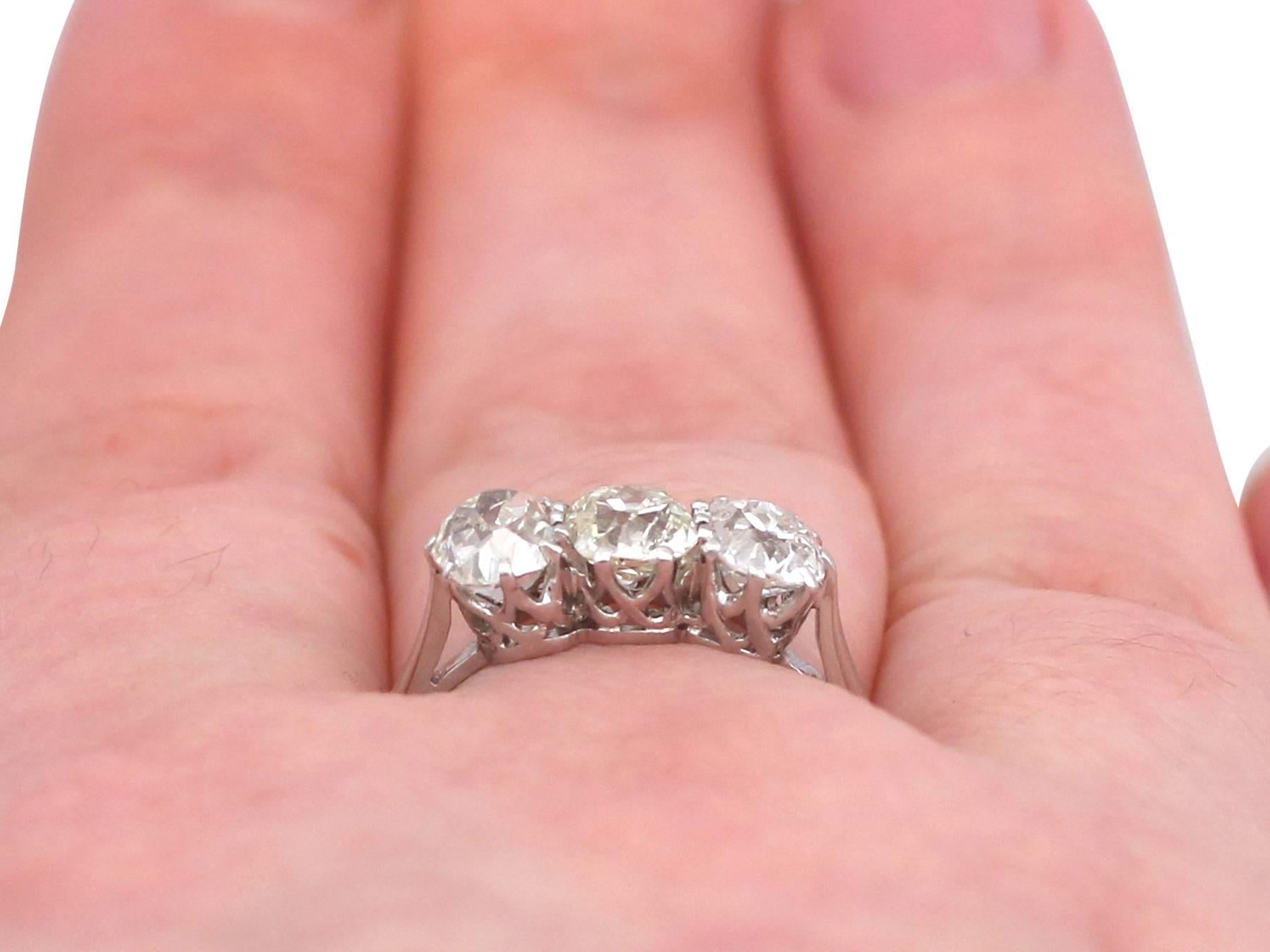 Antique 2 Carat Diamond and Platinum Three-Stone Ring 4