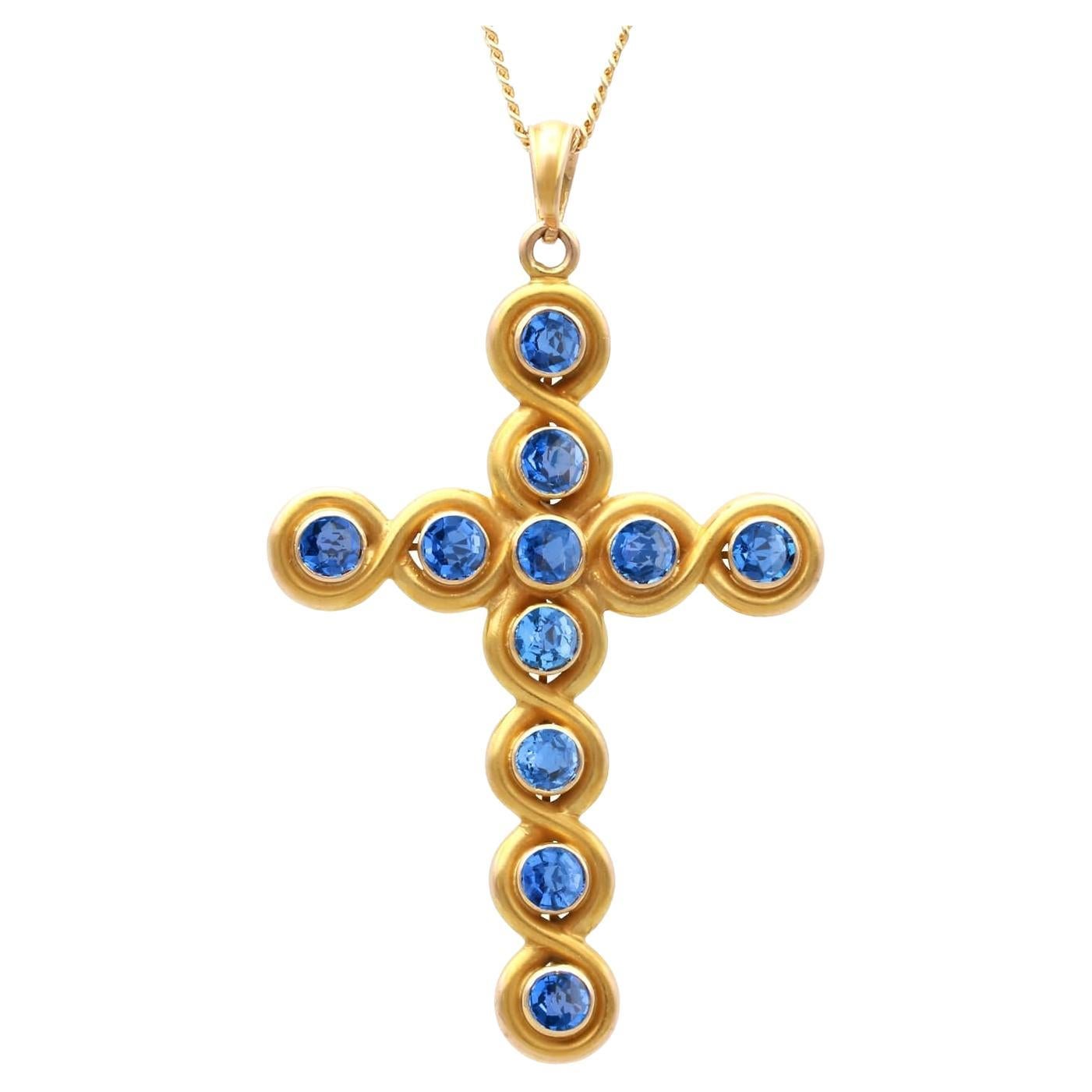 Colgante antiguo de zafiro Montana de 2 quilates y cruz de oro amarillo de 18 quilates Circa 1910