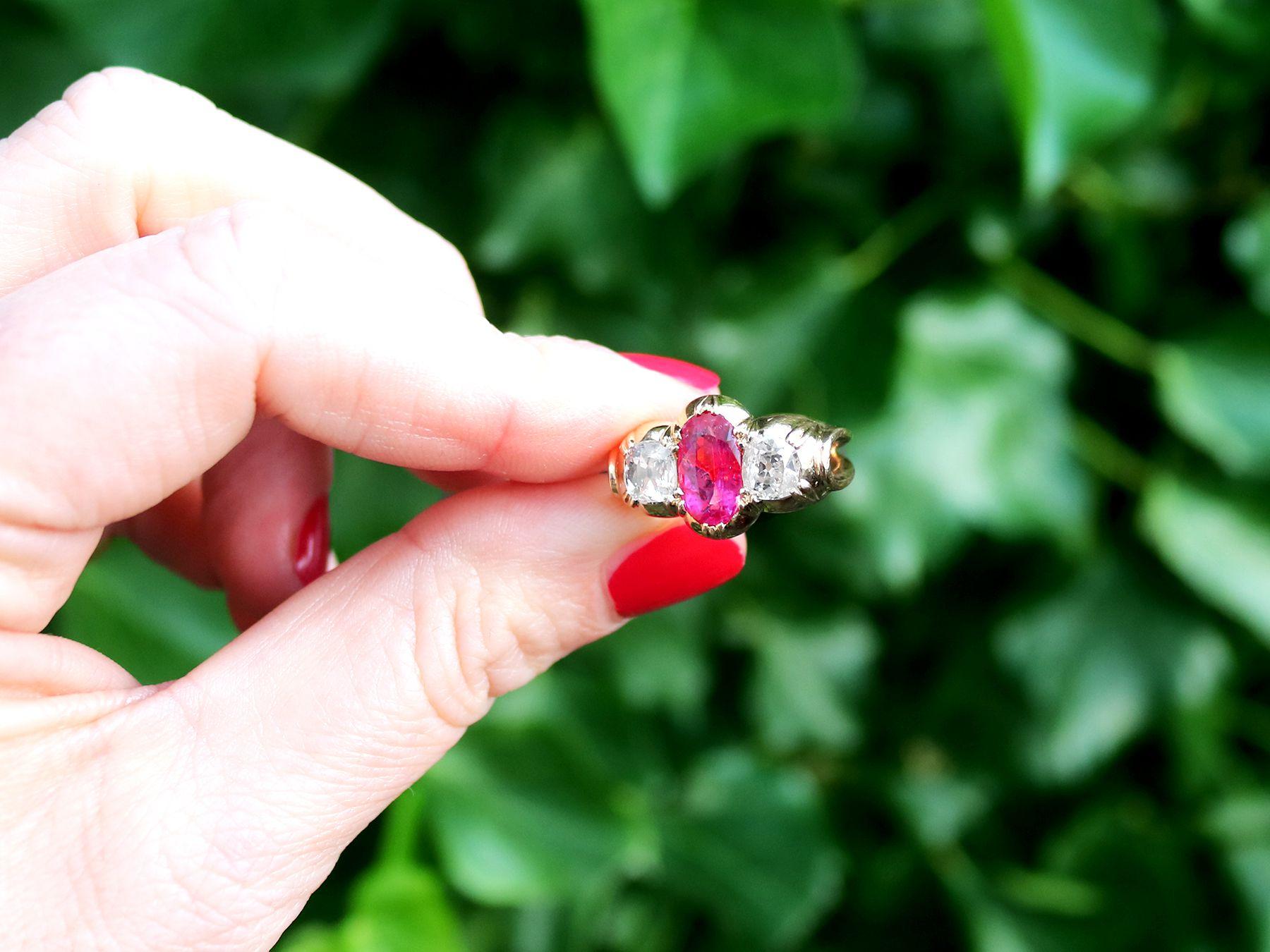 A stunning, fine, and impressive antique Victorian 2 carat Burmese ruby and 0.89 carat diamond, 18 karat yellow gold cocktail ring; part of our diverse antique estate jewelry collections.

This impressive antique diamond and Victorian ruby ring has