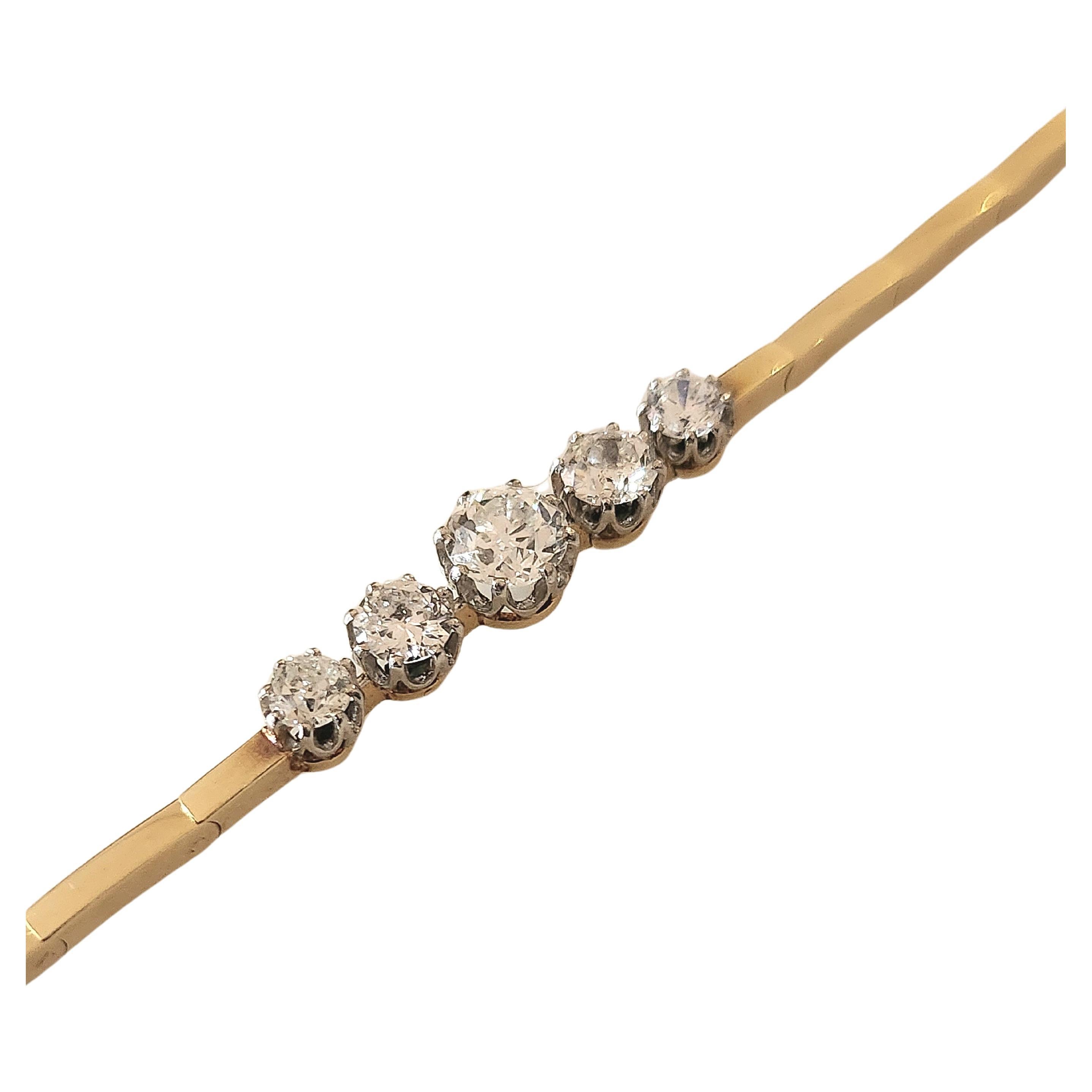 Antique 18k gold link bracelet centered with old mine cut diamonds estimate weight of 2 carats white color excellent spark with total bracelet lengh 18cm in fine workmanship