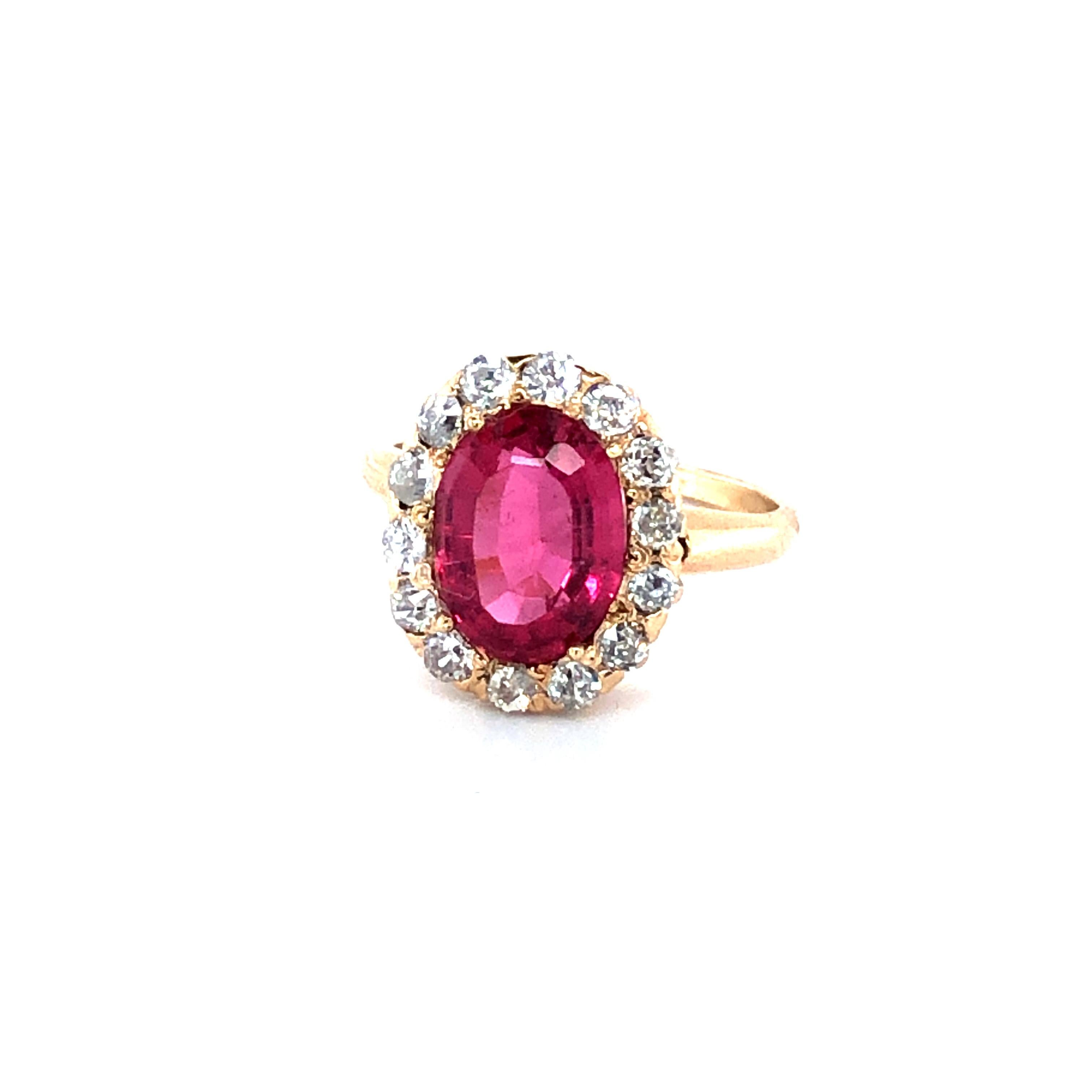 Offered here is a classic Diana engagement ring from way before princess Diana made this style popular, circa early 1900.
Featuring one natural earth mined beautiful pinkish-red ruby weighing approximately 2.00 carats, framed with 14 natural earth