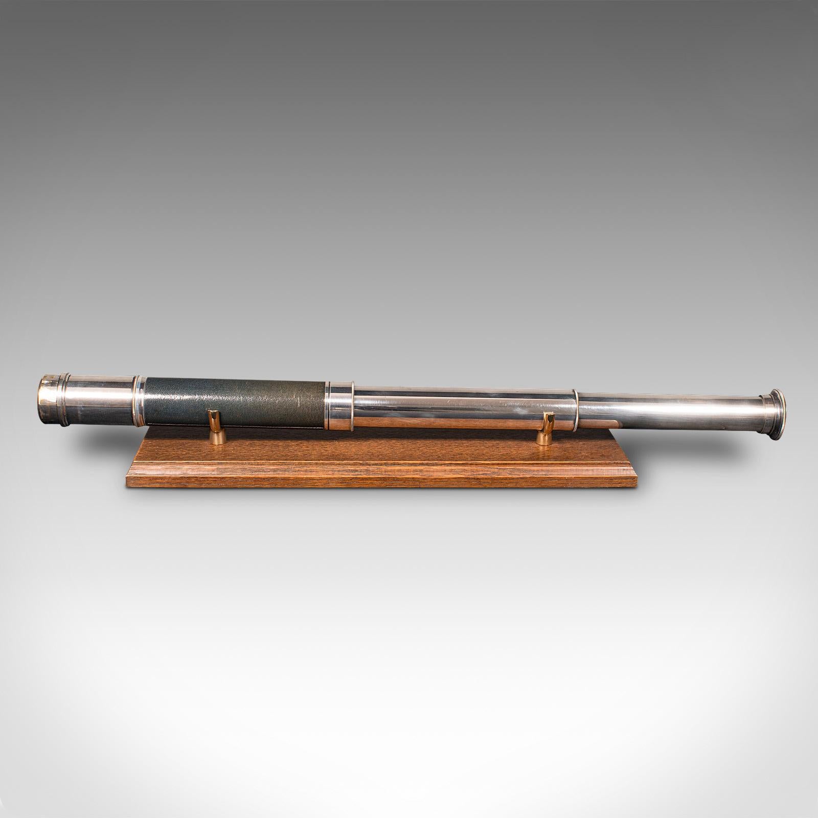 
This is an antique 2 draw telescope. An English, chromed brass terrestrial or astronomical refractor, dating to the late Victorian period, circa 1900.

Perfect for bird watching, landscape appreciation, wildlife, or maritime observation. Equally