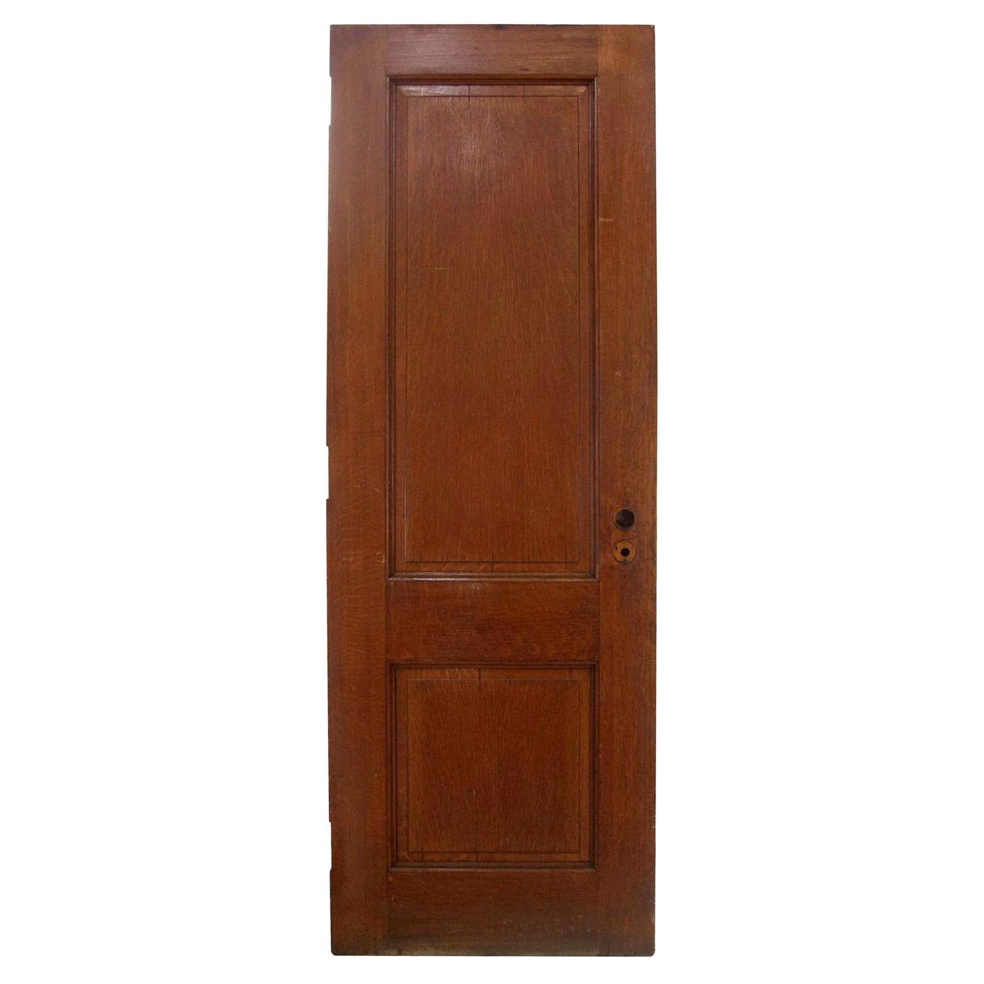 Antique 2 Panel Quarter Sawn Oak Door in a Dark Tone