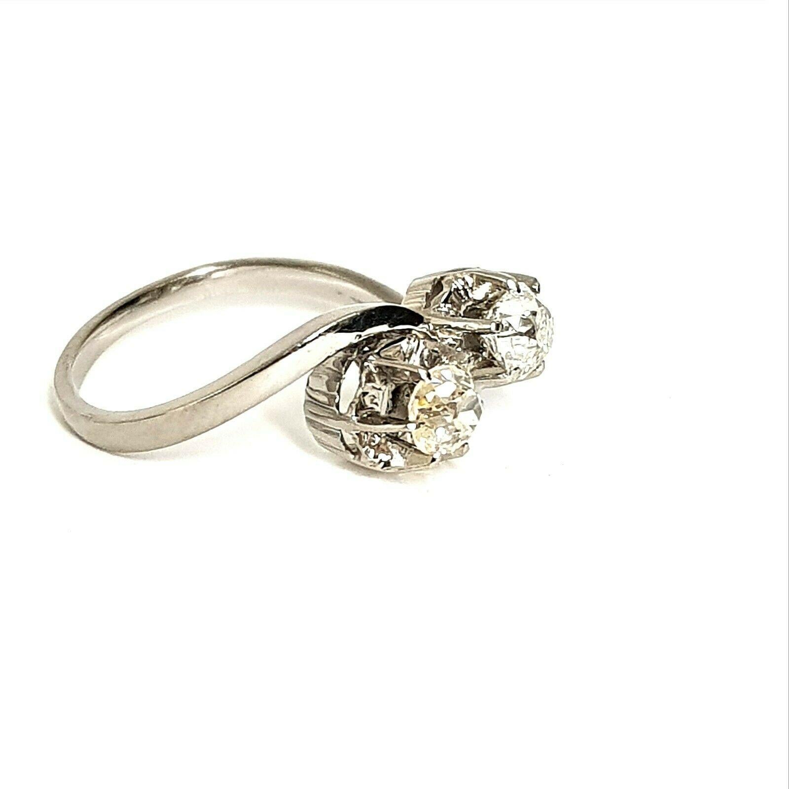  This is an antique 2 stone old cut diamond ring in approximately 0.30 carat total weight, I color and SI2 stone clarity. 
Specifications:
    main stone: OLD CUT ROUND DIAMOND
    diamonds: NONE
    carat total weight: APPROXIMATELY 0.30CTW
   