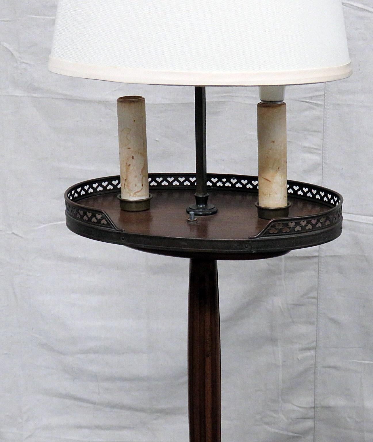 antique table with lamp attached