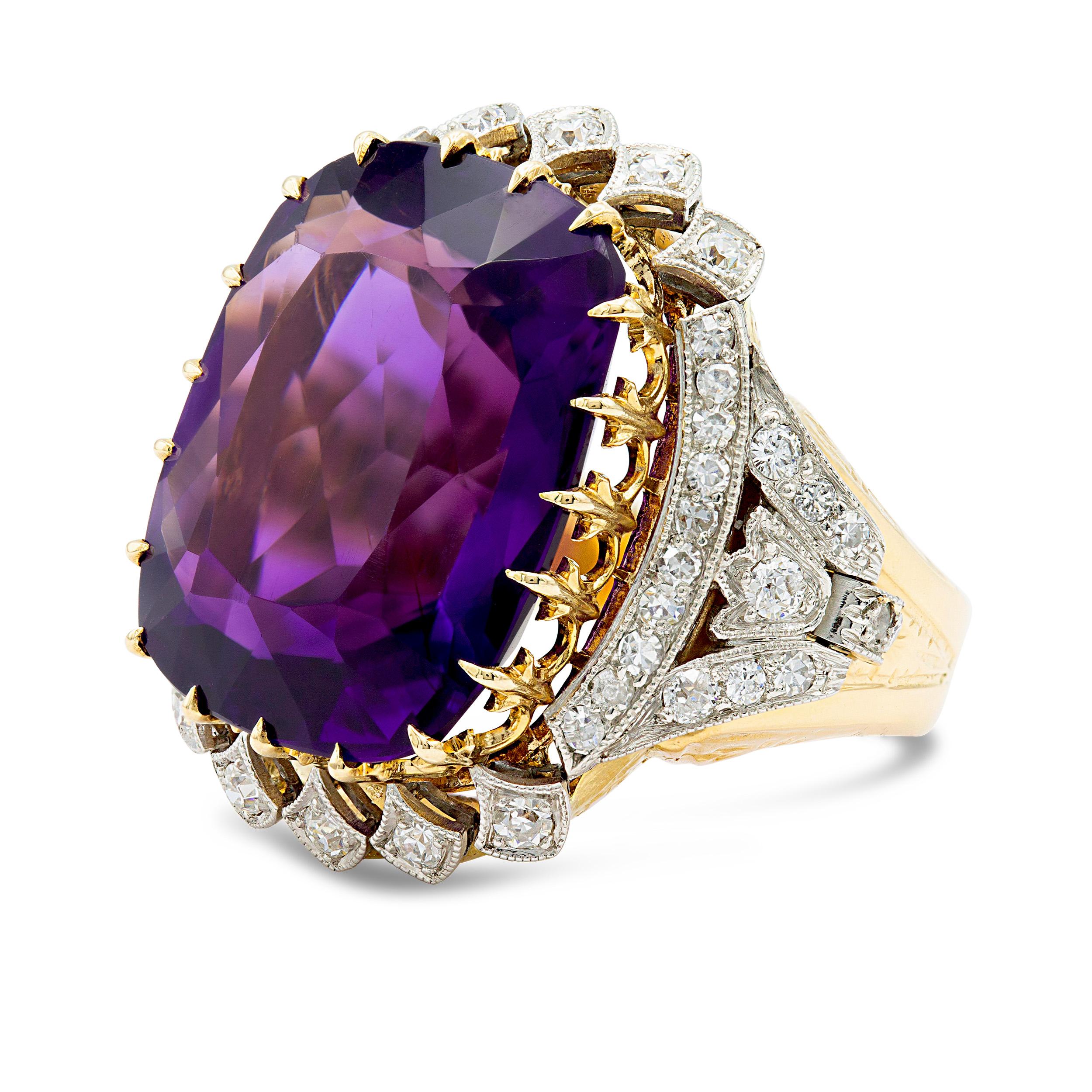 This cocktail ring is fit for royalty and has some serious retro vibes. A bevy of fleur de lis style prongs holds the substantial Amethyst at the center of this ornate ring. Between its two-tone setting, fine milgraine, and 48 accent diamonds, she's