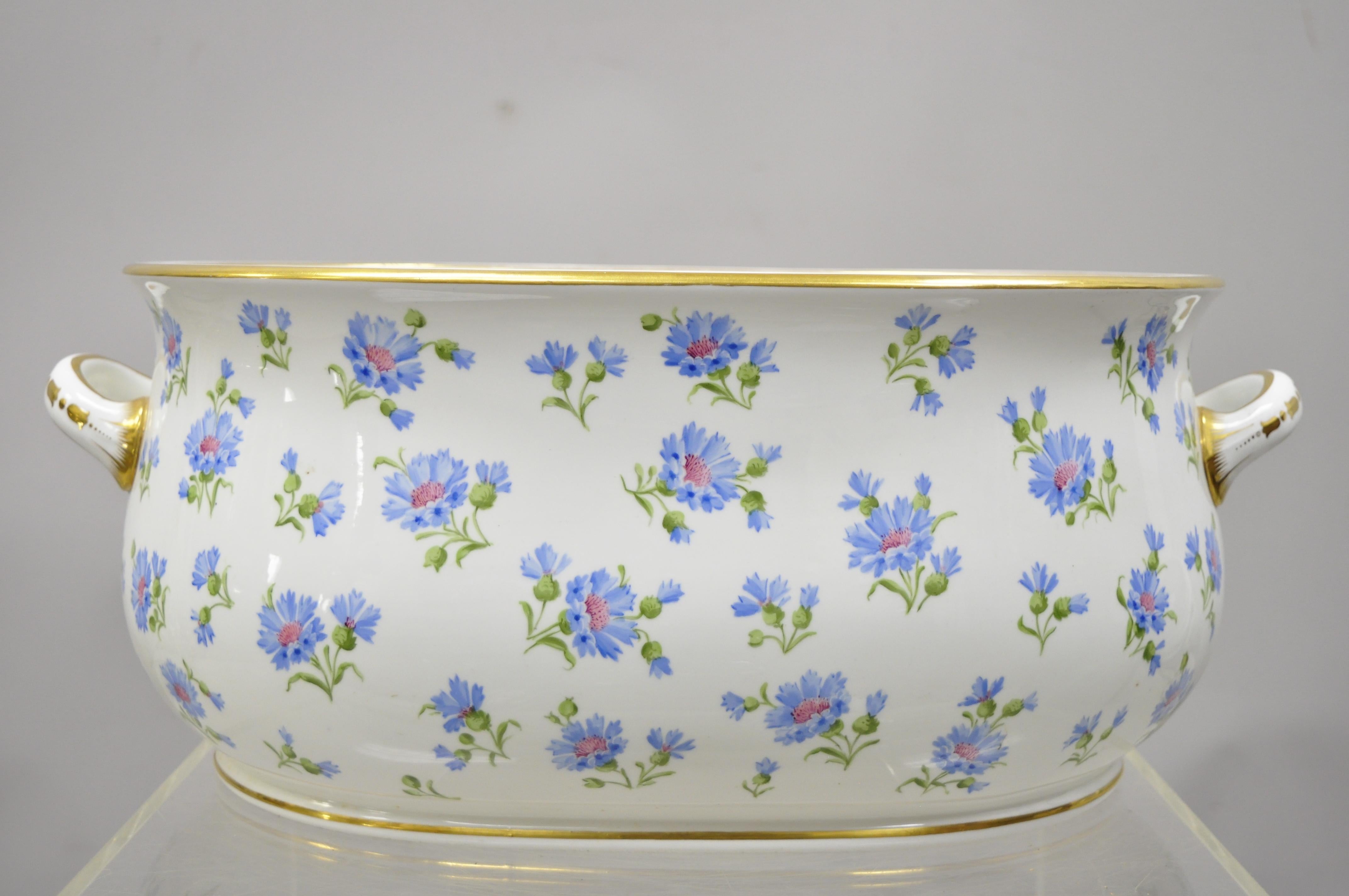 Antique English A.B. Daniell and Son blue flower porcelain foot bath basin. Item features a large impressive size, gold rim, hand painted blue flowers, ornately decorated handles, original stamp, very nice antique item, circa early 1900s.