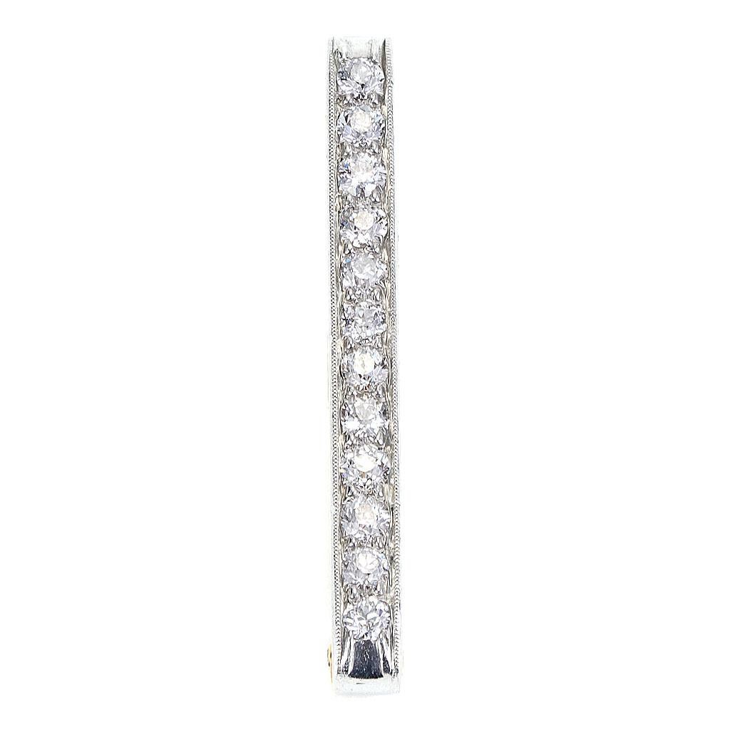 This antique diamond pin is weighs 4.4 DWT (approx. 6.84 grams). It contains 12 european G-H color and SI clarity diamonds weighing 2.00 CTTW.